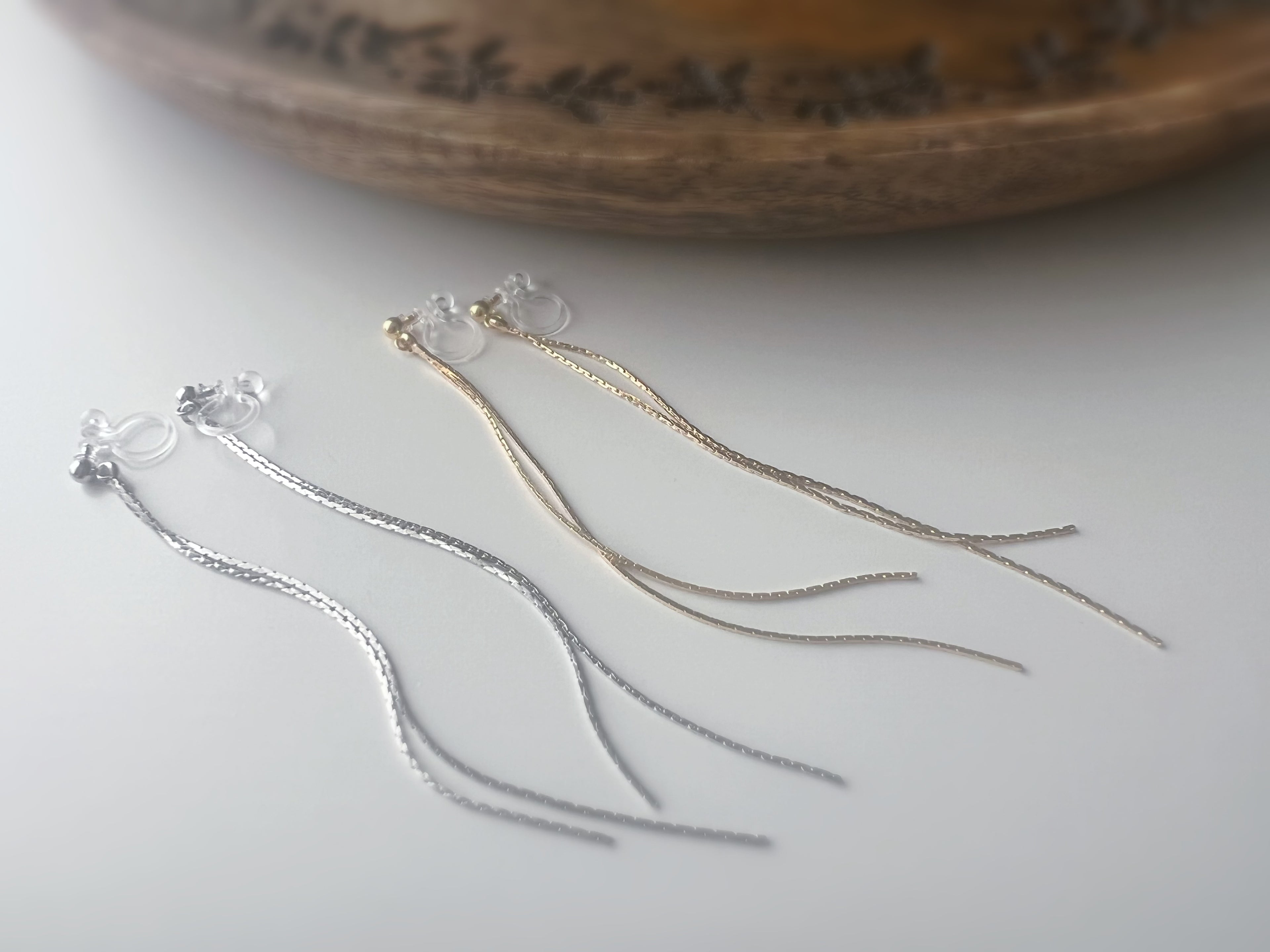 Longues Lignes Fluides – couleur Or / Argent