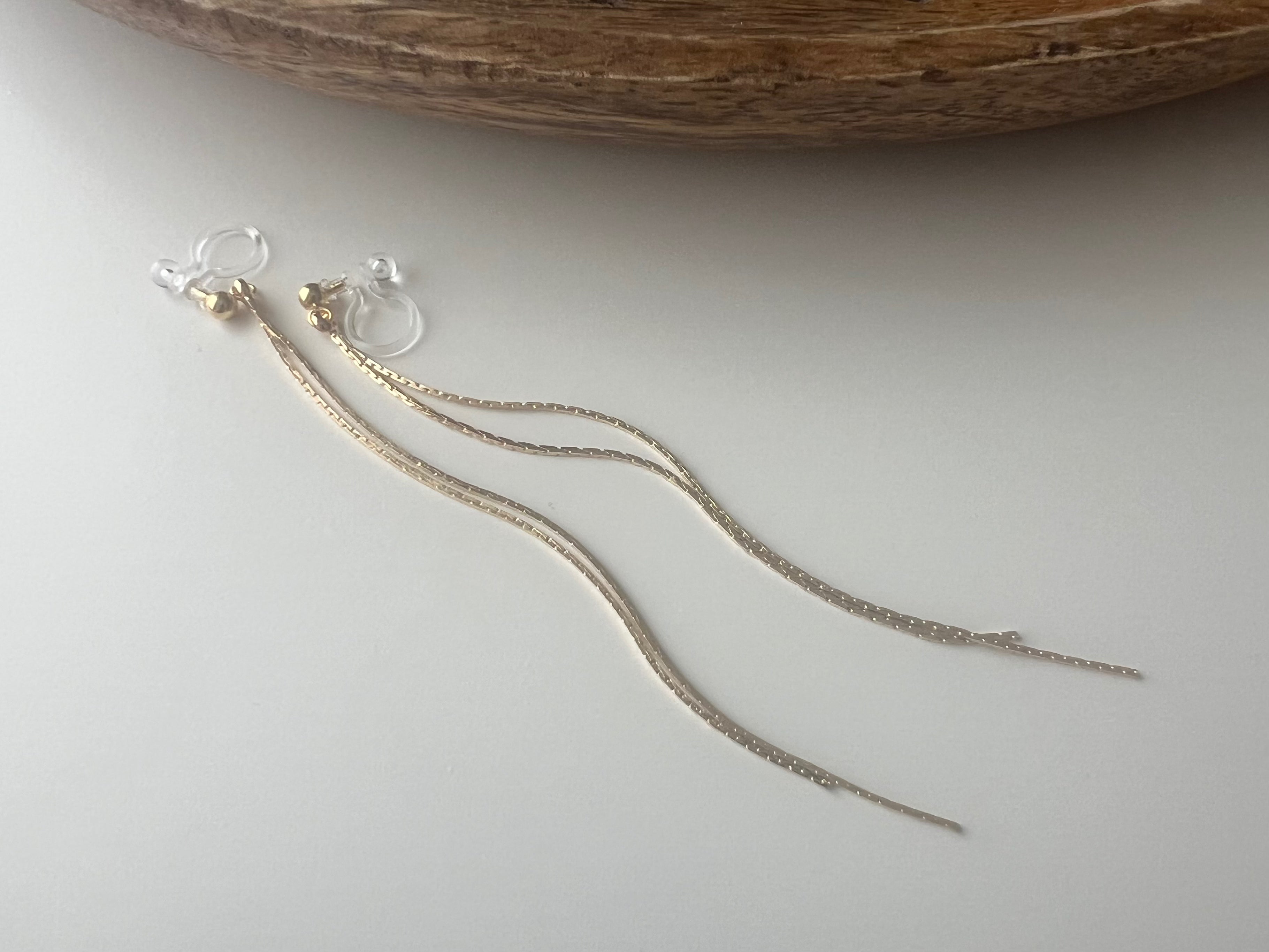 Longues Lignes Fluides – couleur Or / Argent