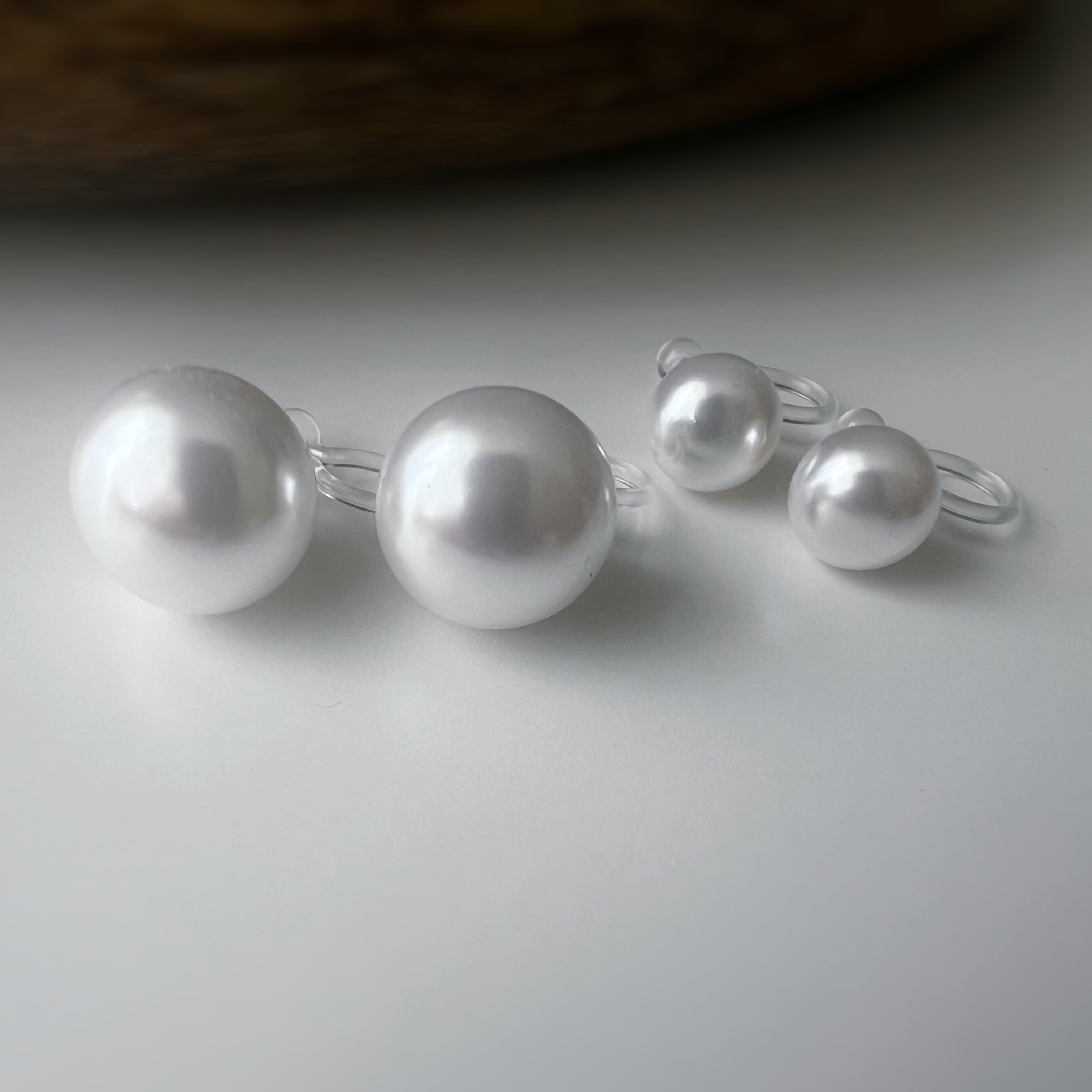 Clips d’oreilles Invisibles perle blanche