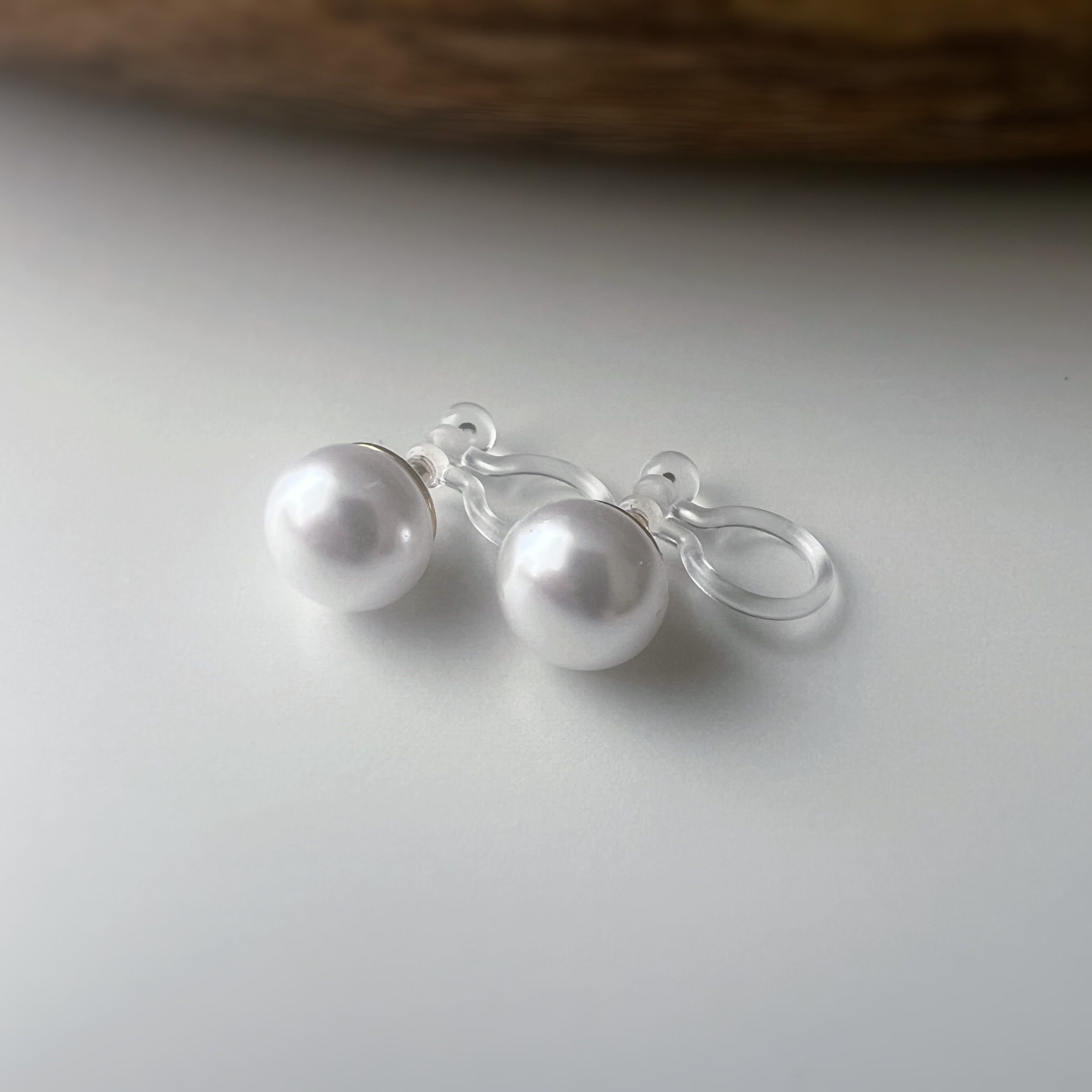 Clips d’oreilles Invisibles perle blanche