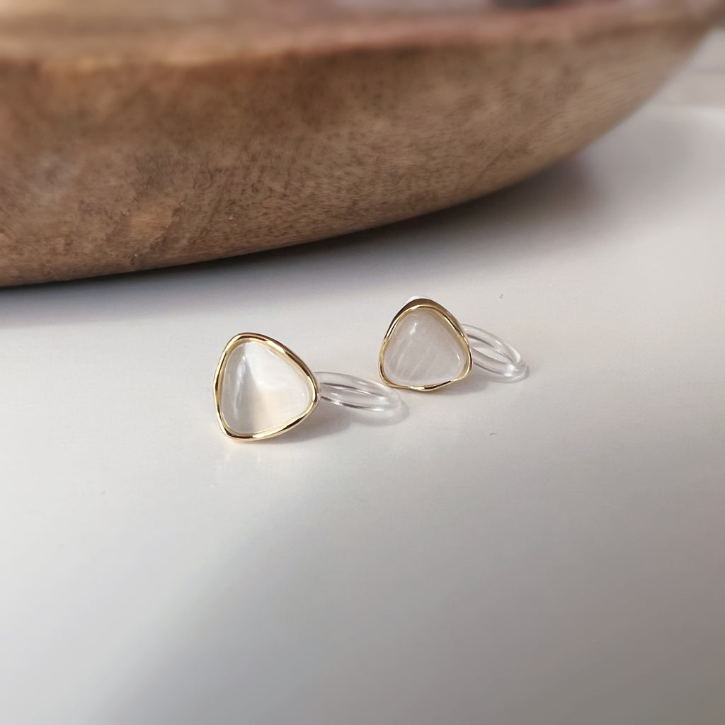 Clips d’oreilles œil de chat blanc crème