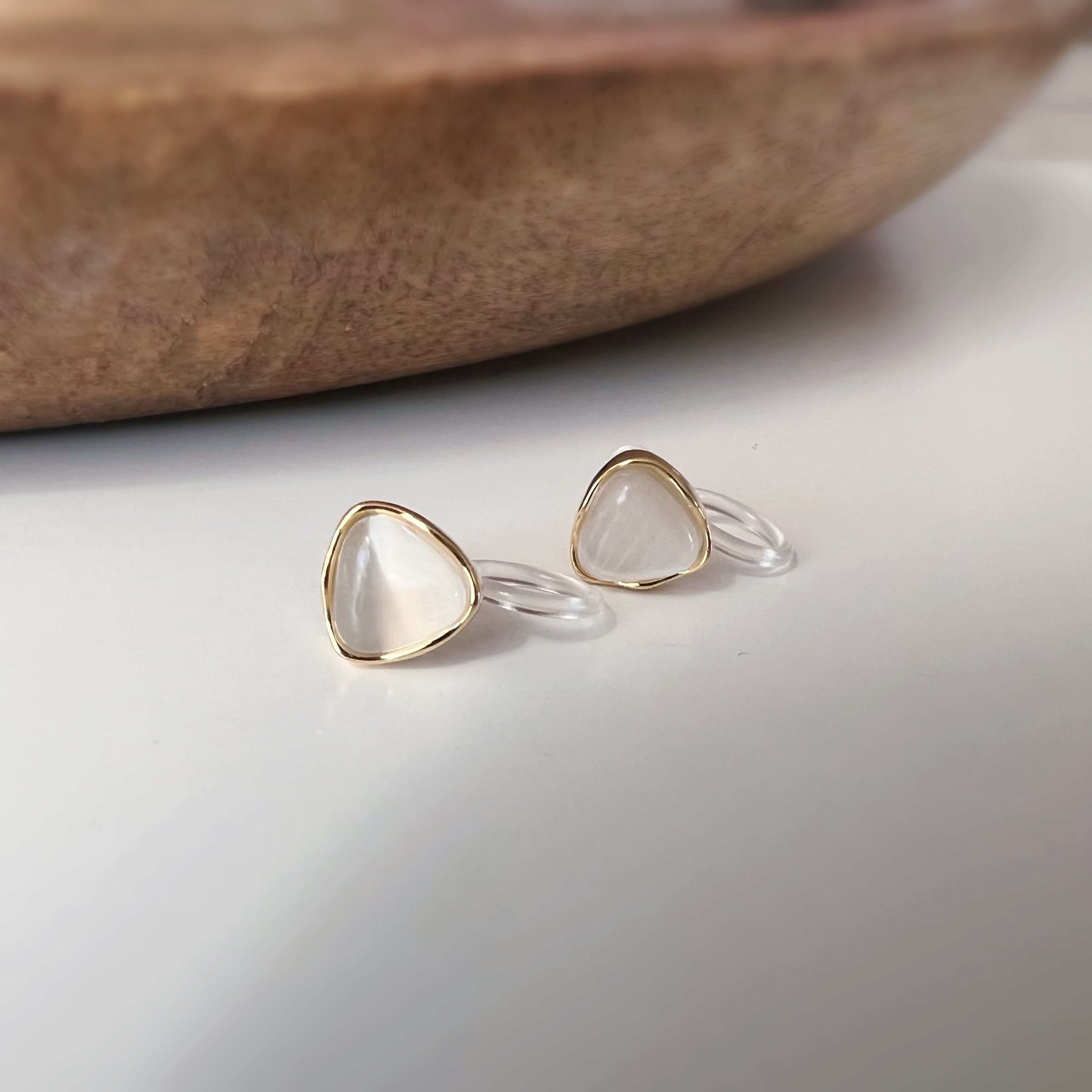 Clips d’oreilles œil de chat blanc crème