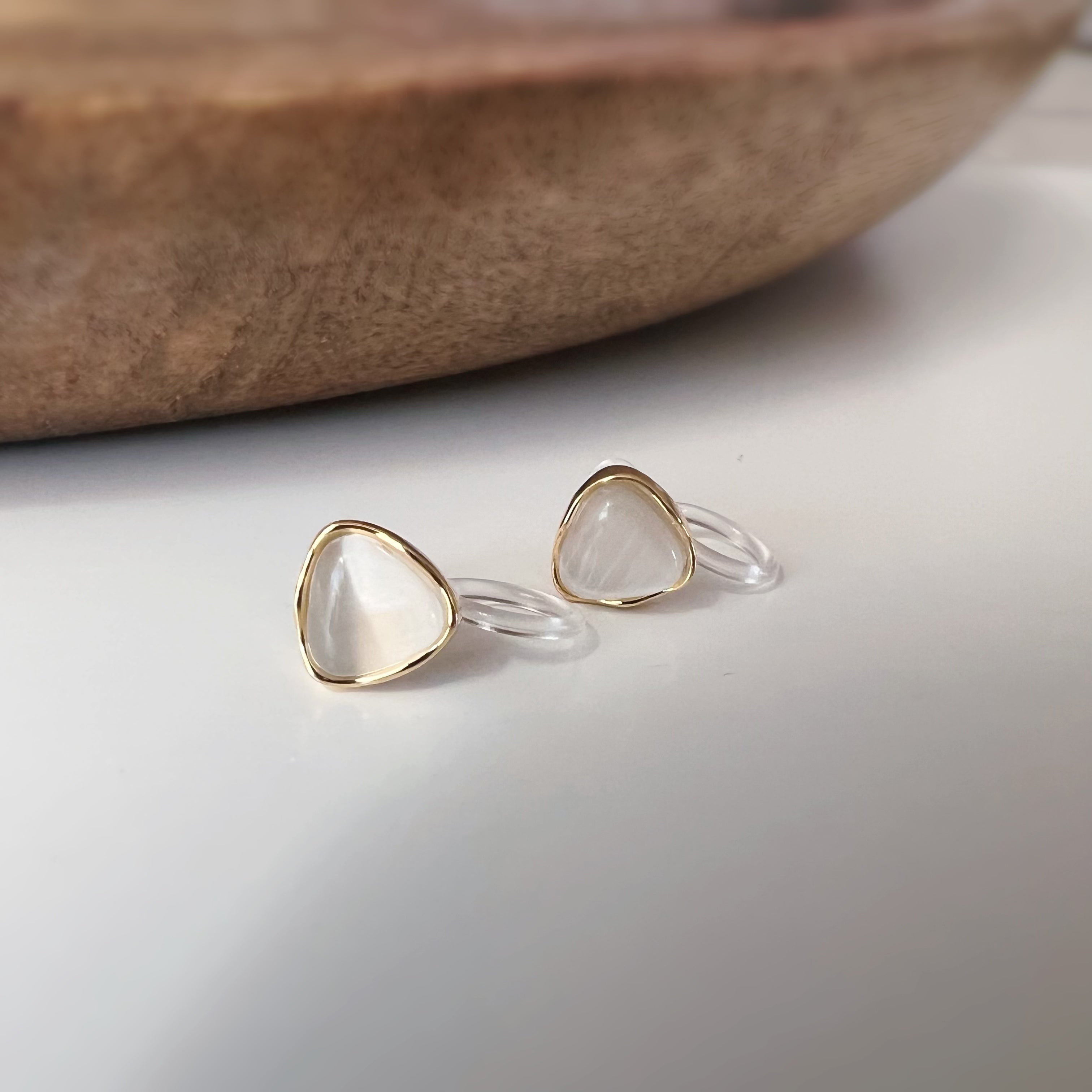 Clips d’oreilles œil de chat blanc crème