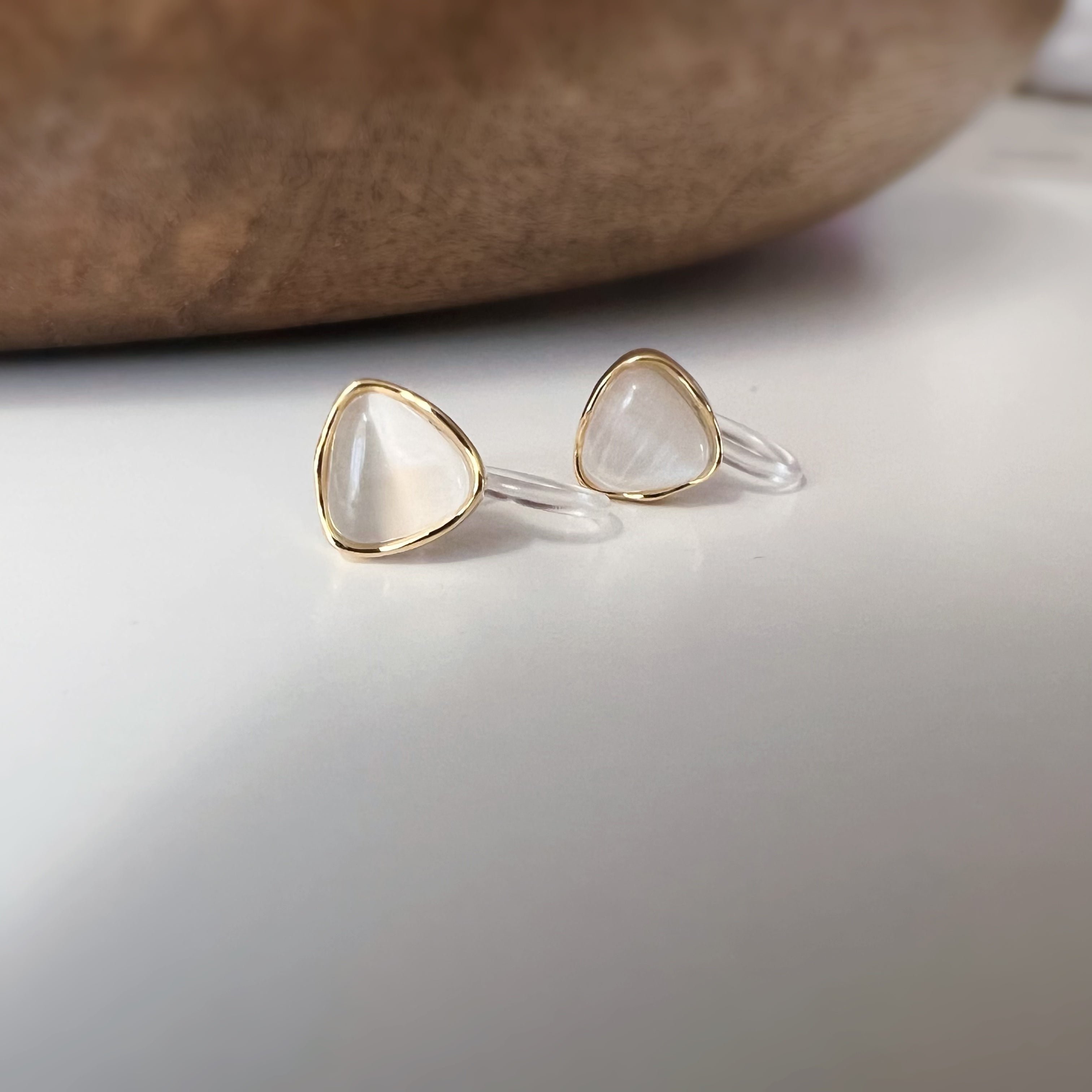 Clips d’oreilles œil de chat blanc crème
