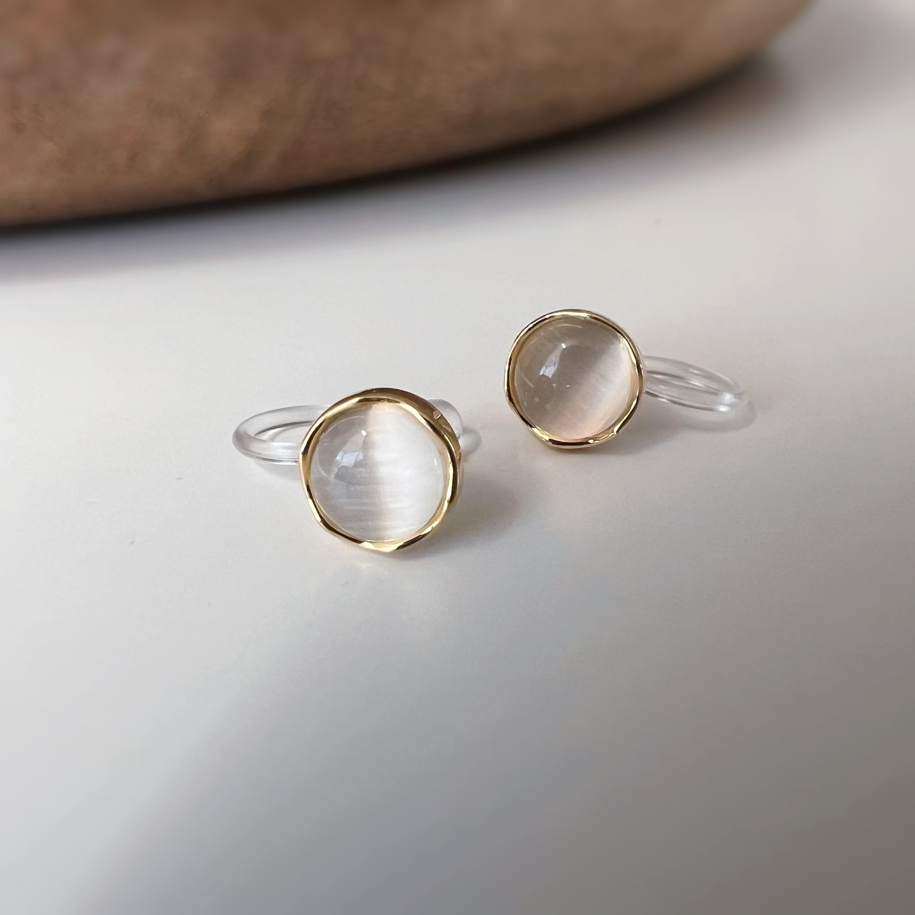 Clips d’oreilles œil de chat blanc crème