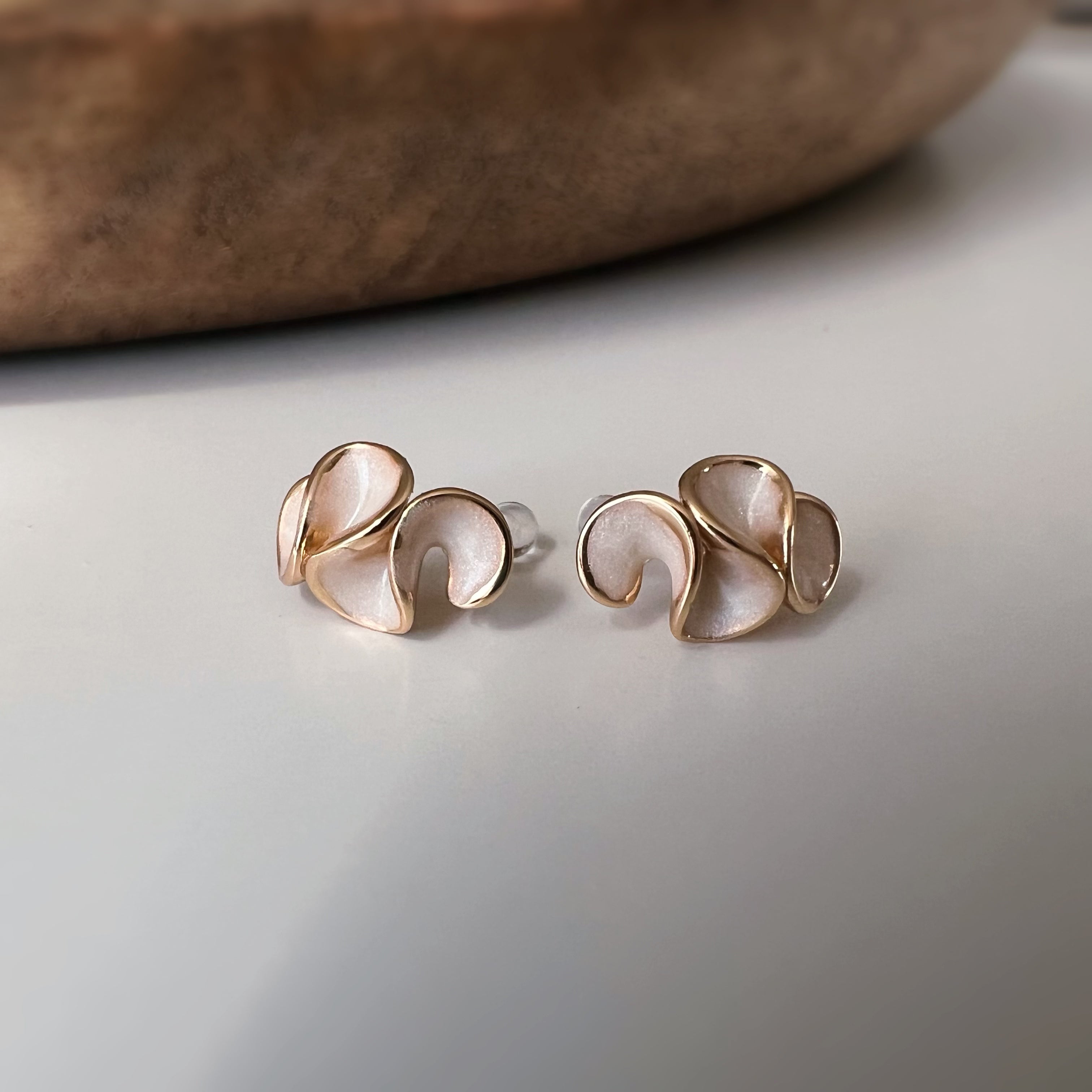 Pretty petal clip-on earrings with cream enamel finish