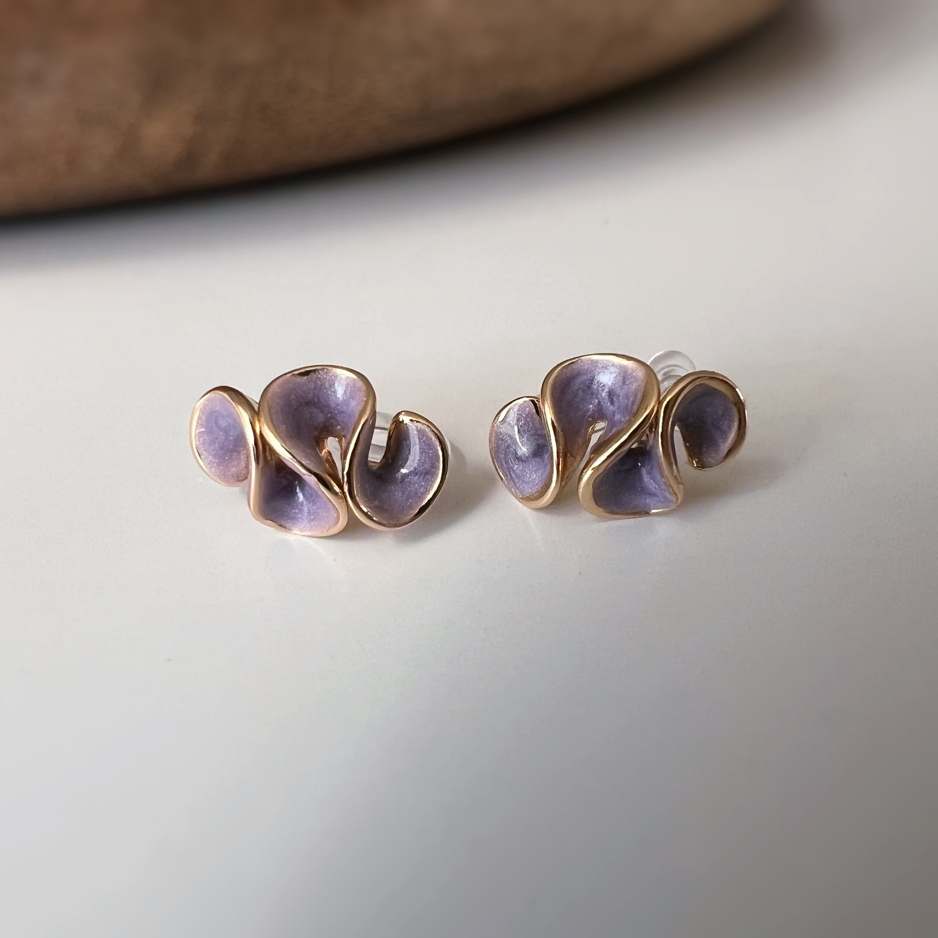 Pretty petal clip-on earrings with cream enamel finish