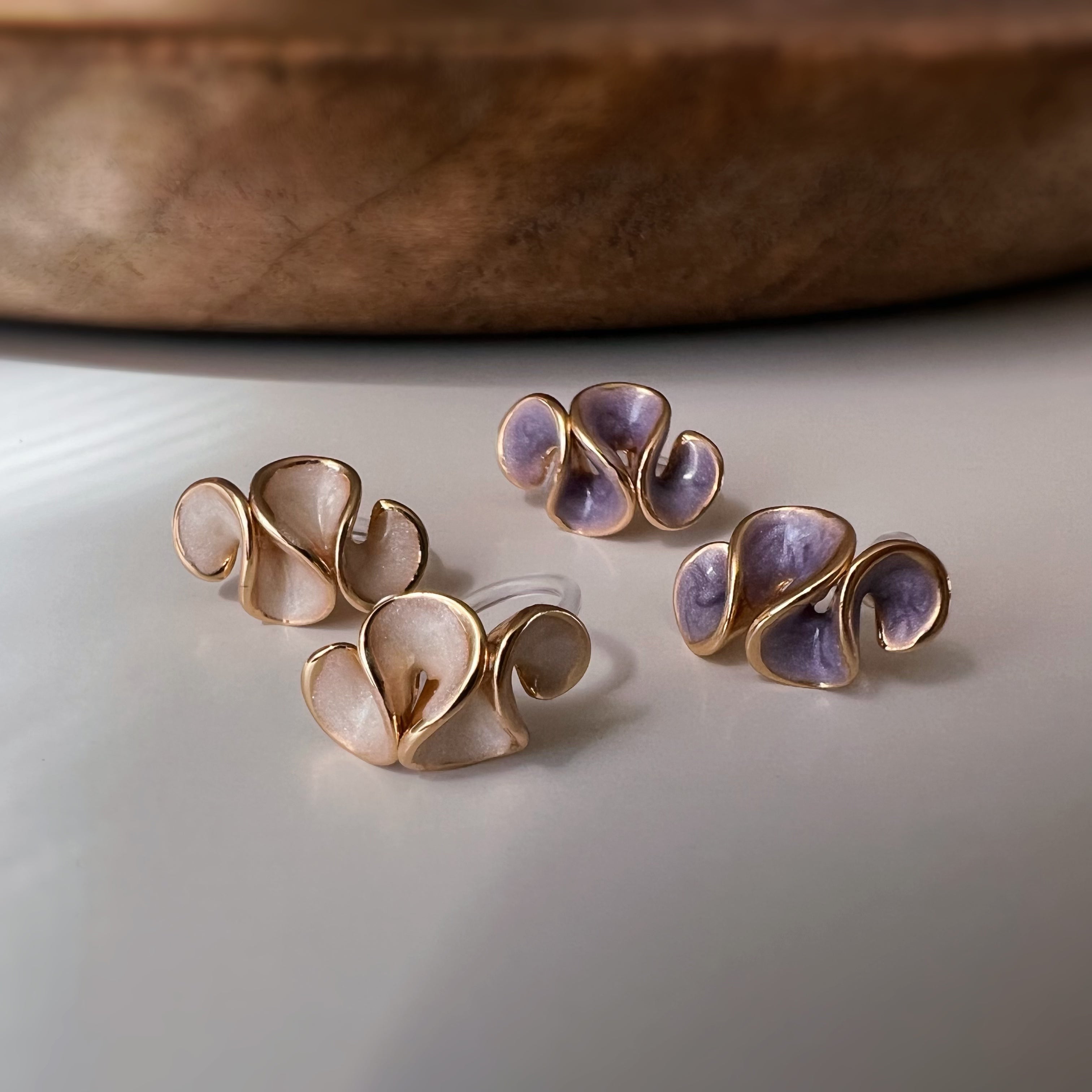 Pretty petal clip-on earrings with cream enamel finish