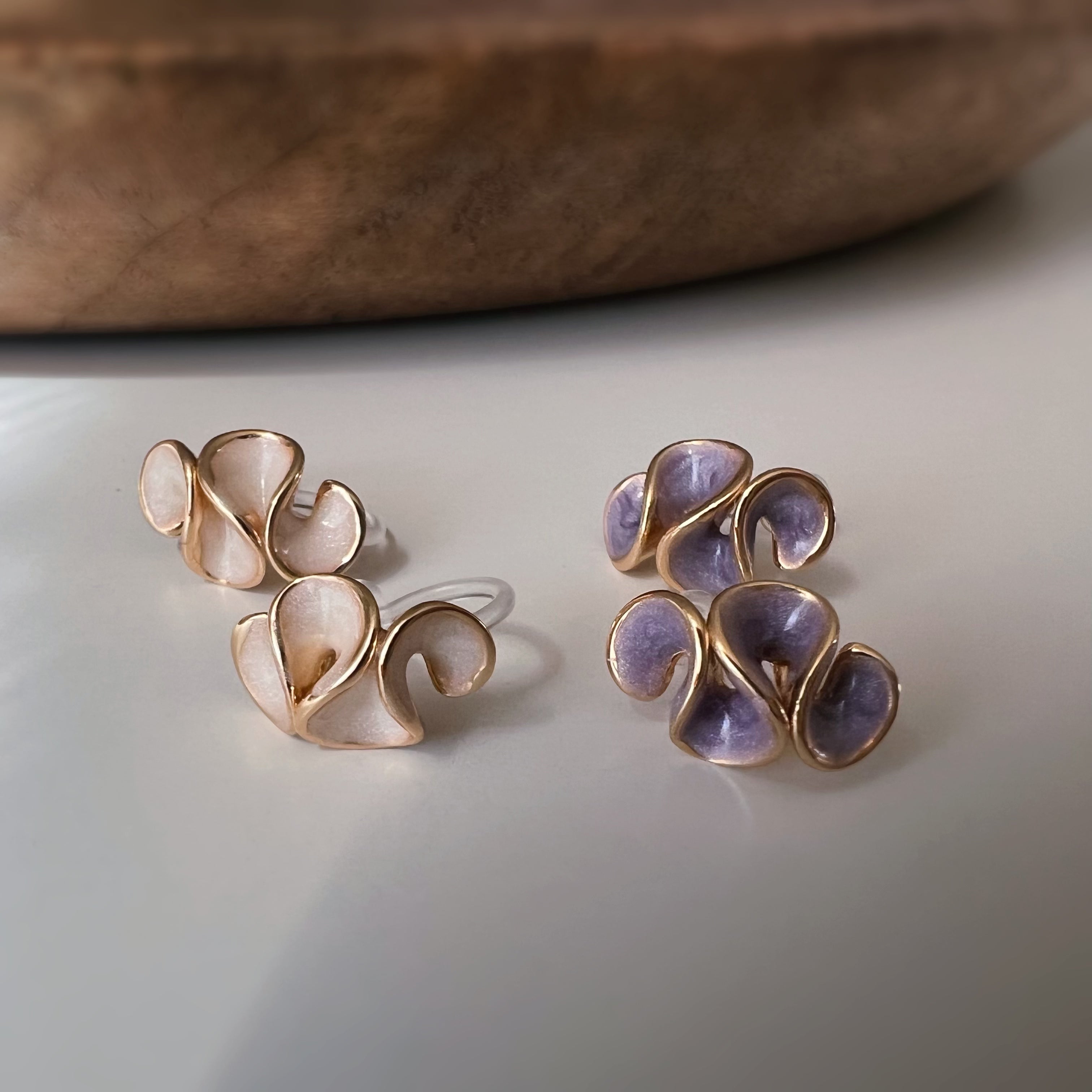 Pretty petal clip-on earrings with cream enamel finish
