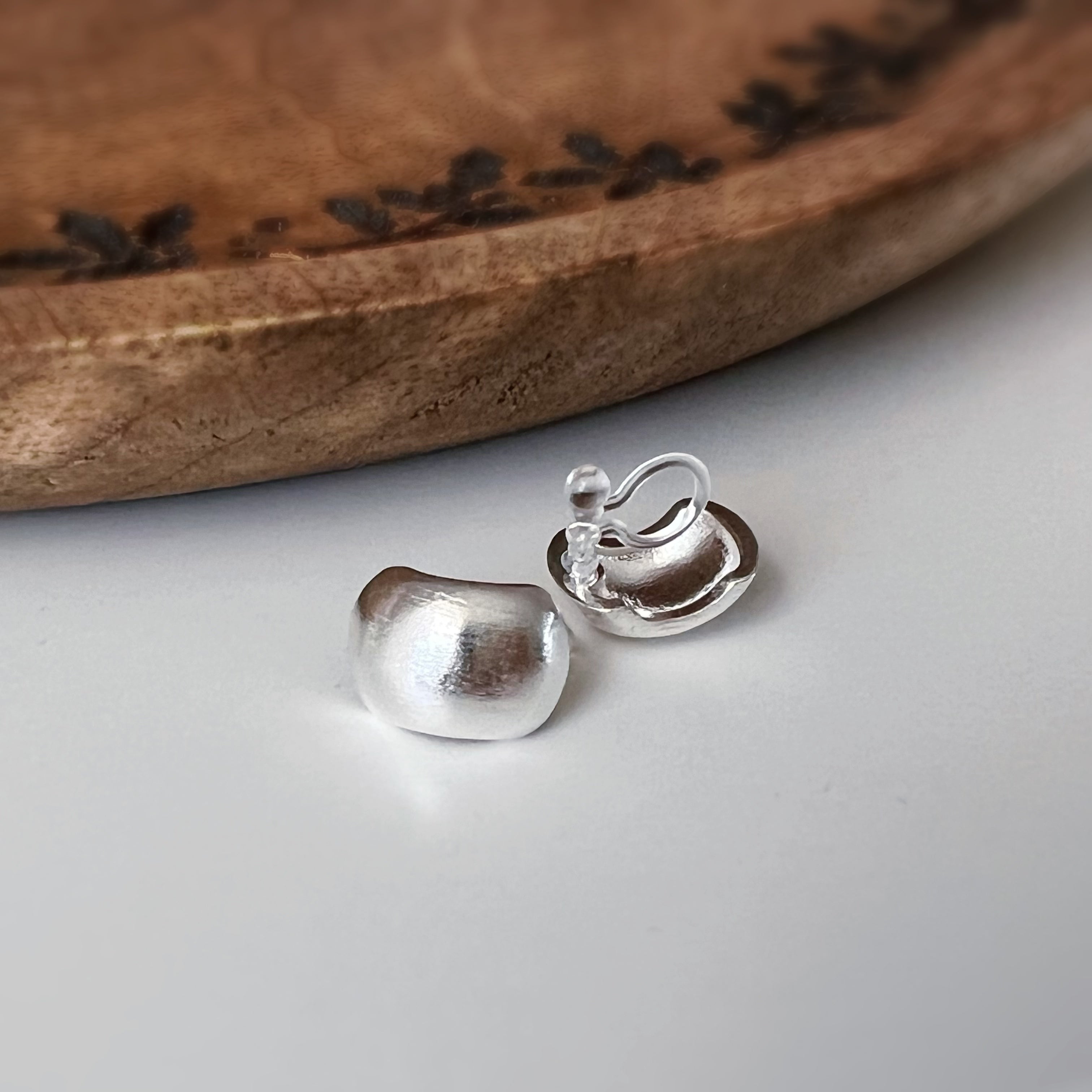 Small rounded square silver clip-on earrings
