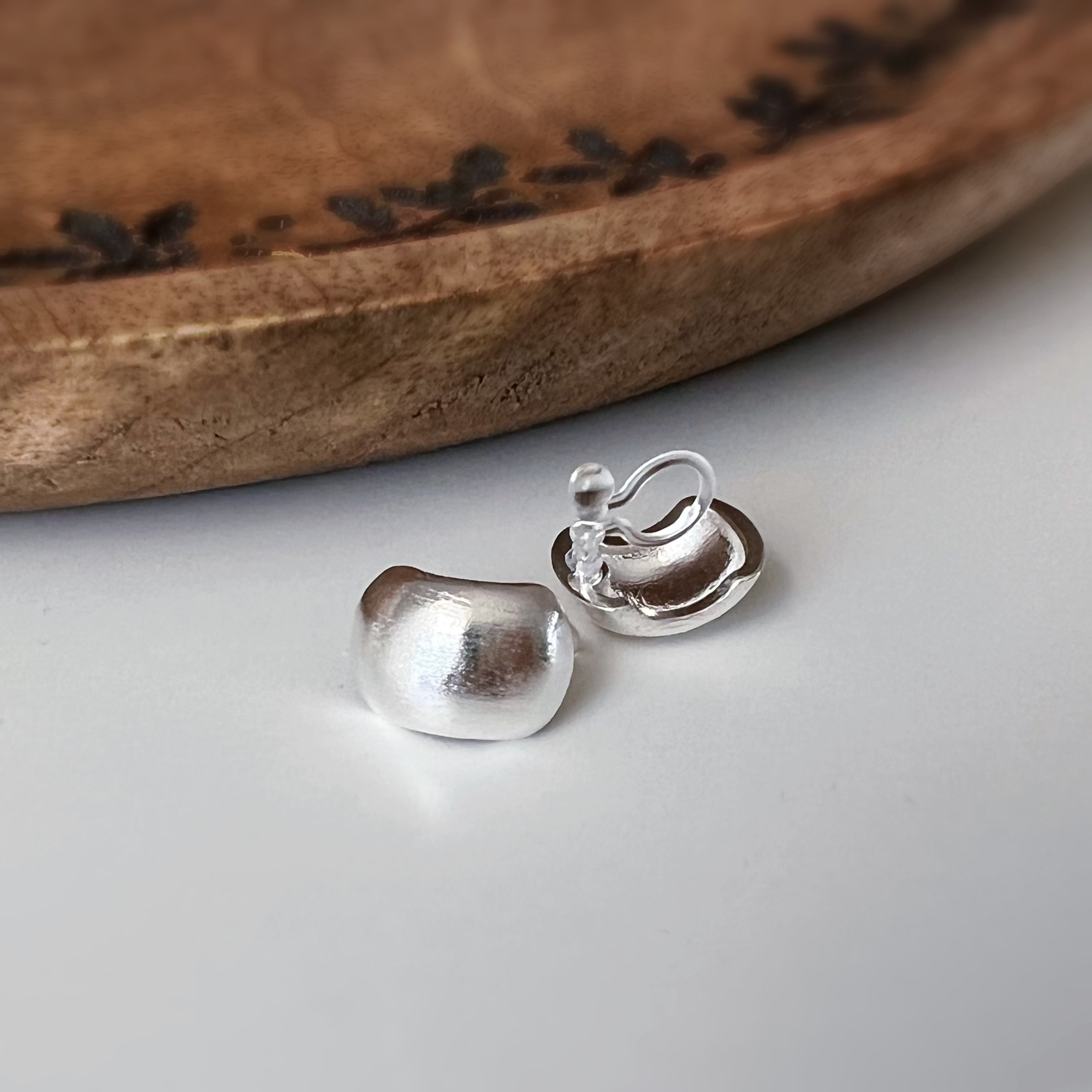 Small rounded square silver clip-on earrings