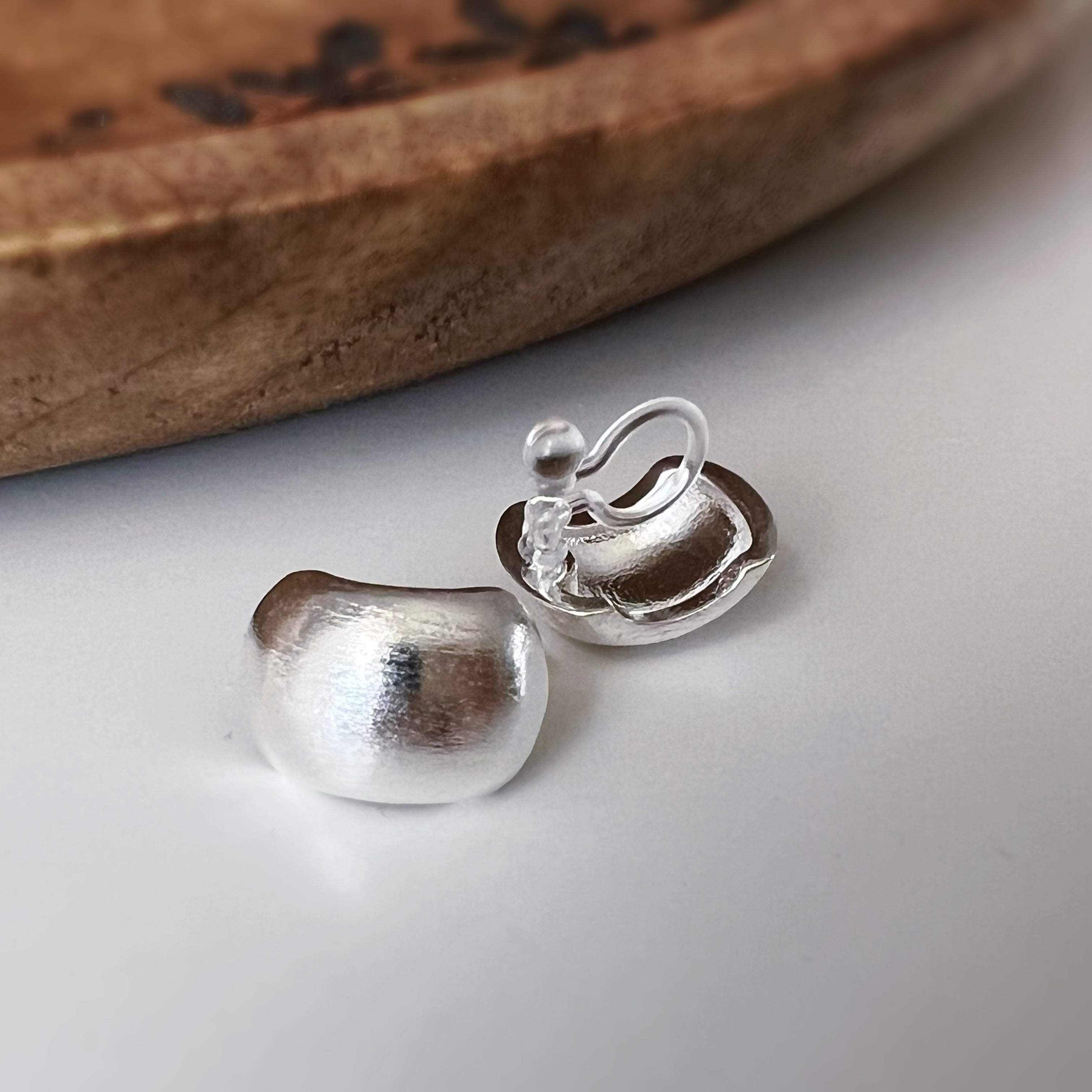 Small rounded square silver clip-on earrings