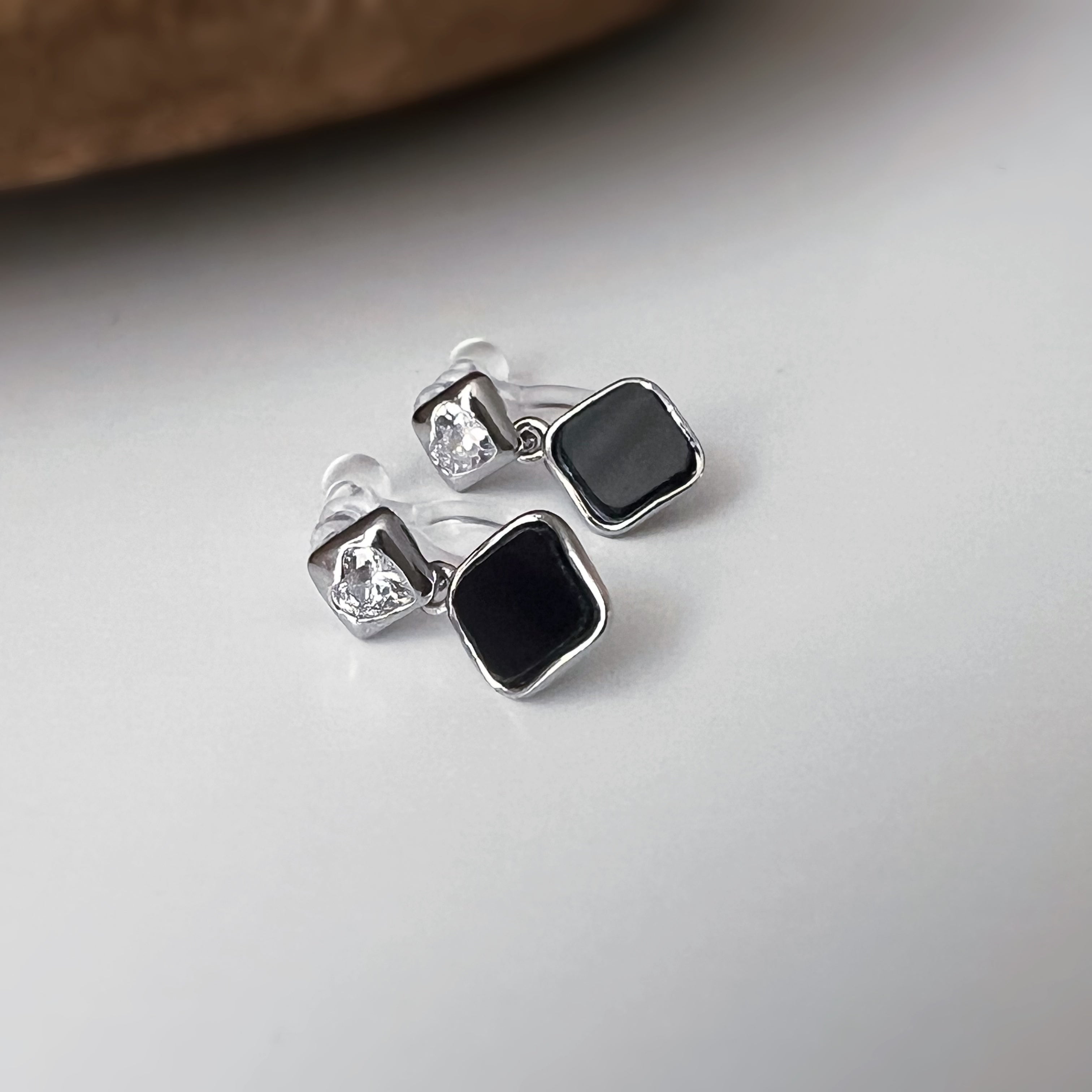 Square enameled clip-on earrings in silver, mother-of-pearl blue, black, or white