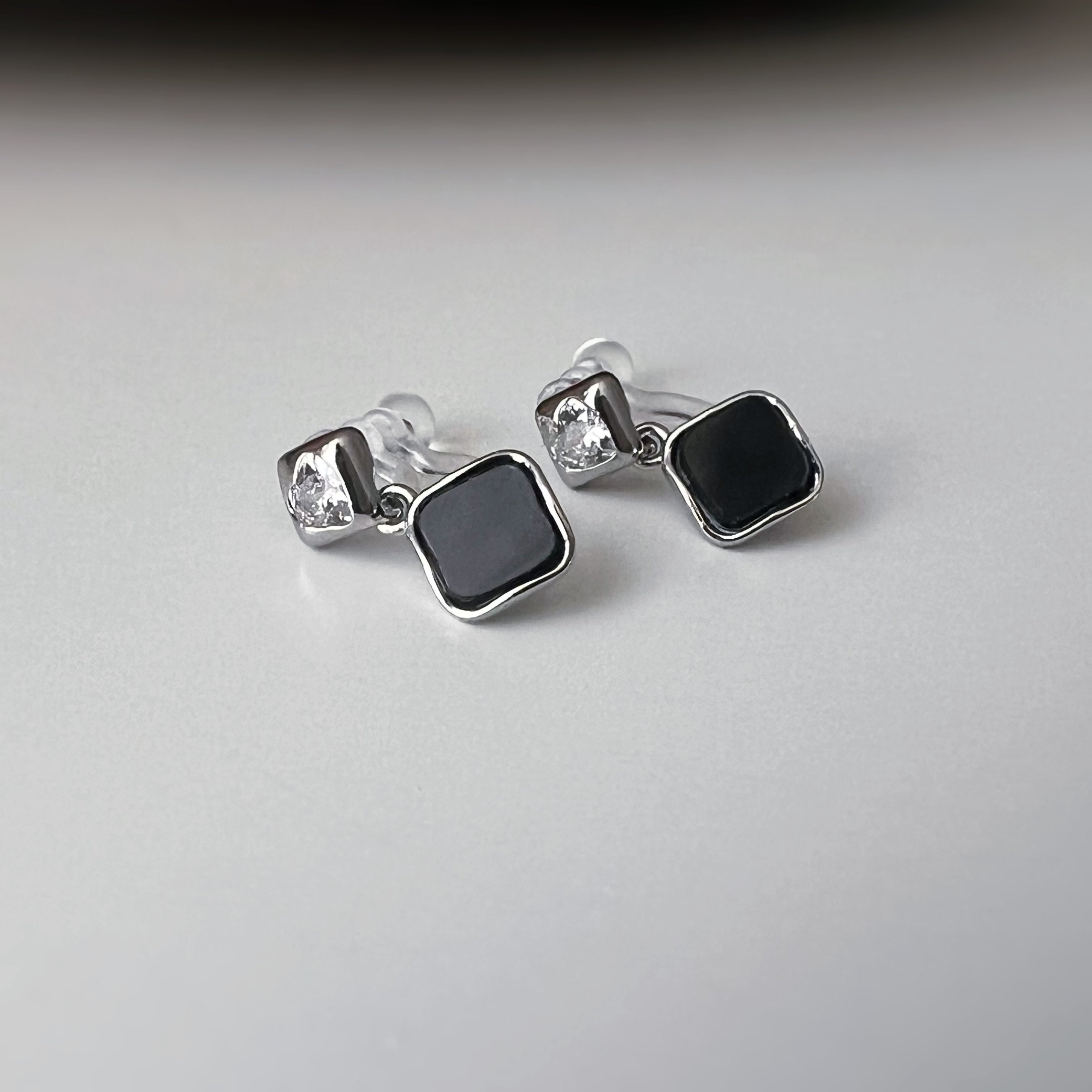 Square enameled clip-on earrings in silver, mother-of-pearl blue, black, or white