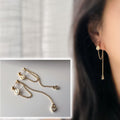 Clips d’oreilles smiley chaîne pendante
