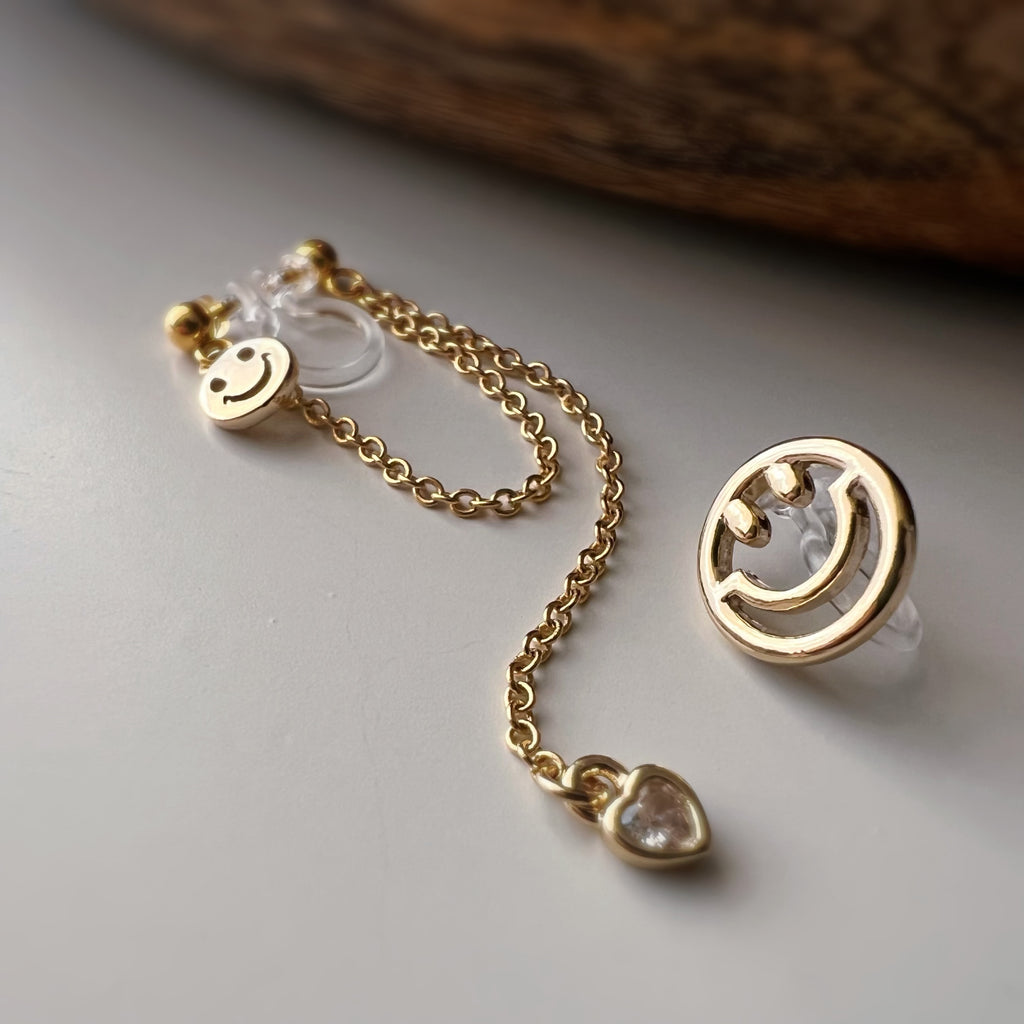 Clips d’oreilles asymétriques smiley