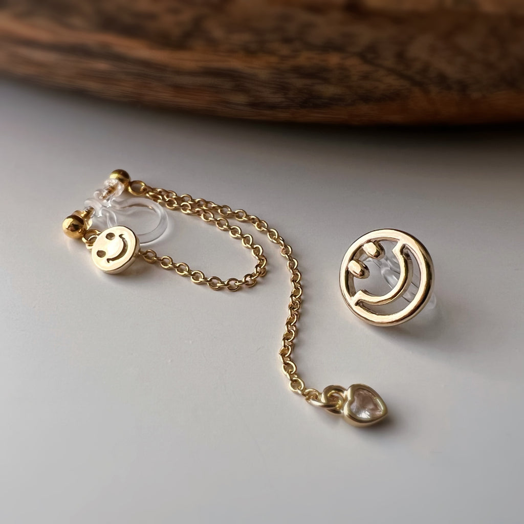 Clips d’oreilles asymétriques smiley