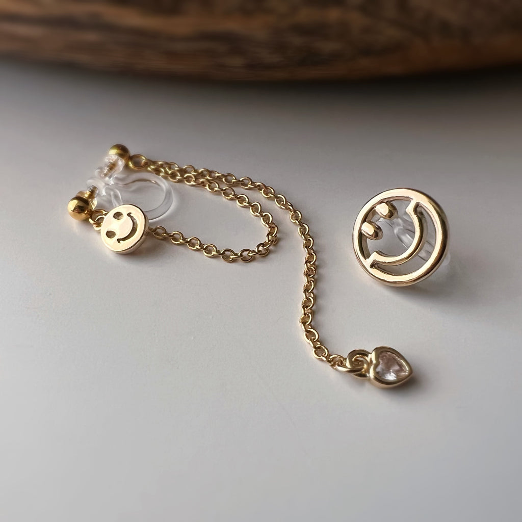 Clips d’oreilles asymétriques smiley