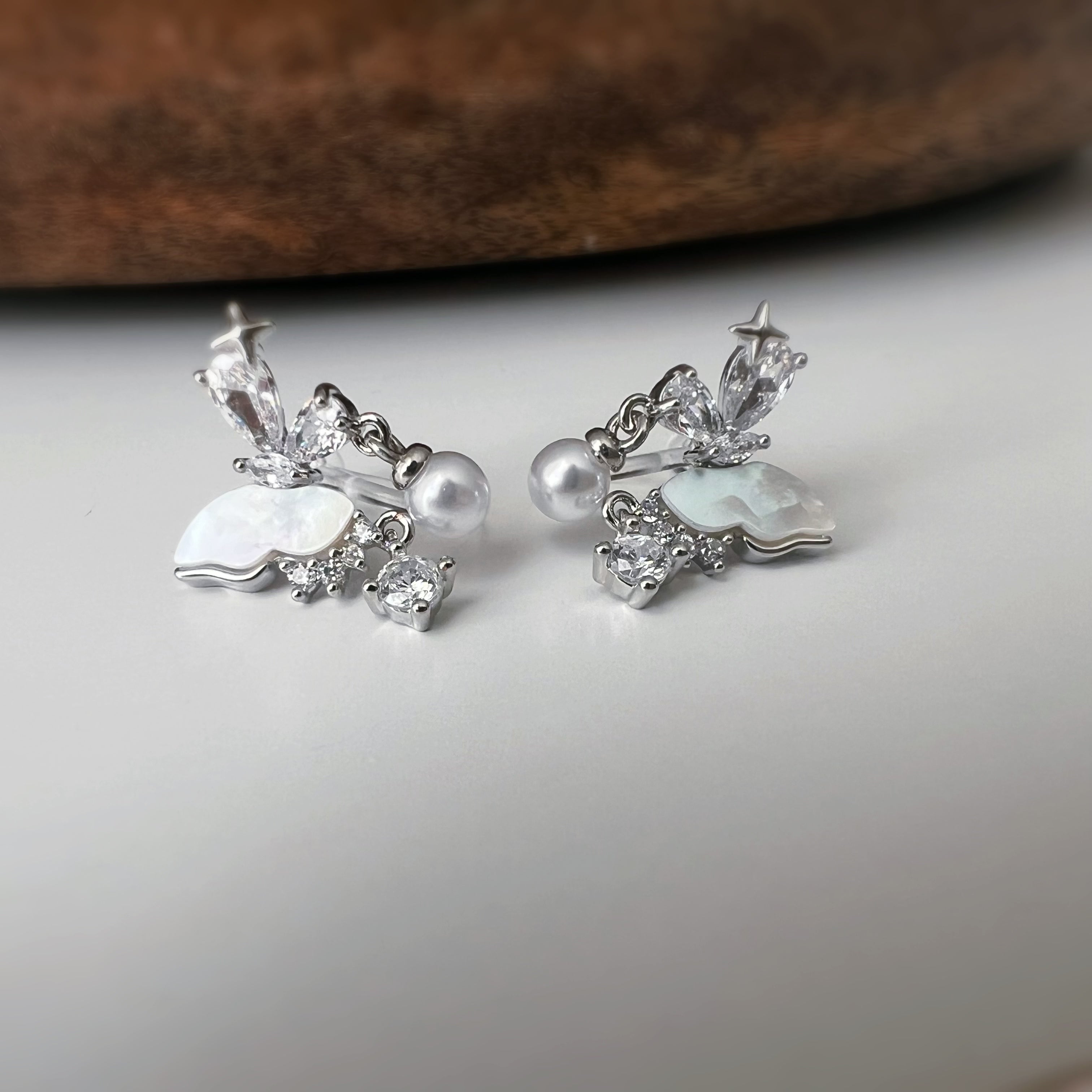 Clips d’oreilles papillon & étoiles nacrées