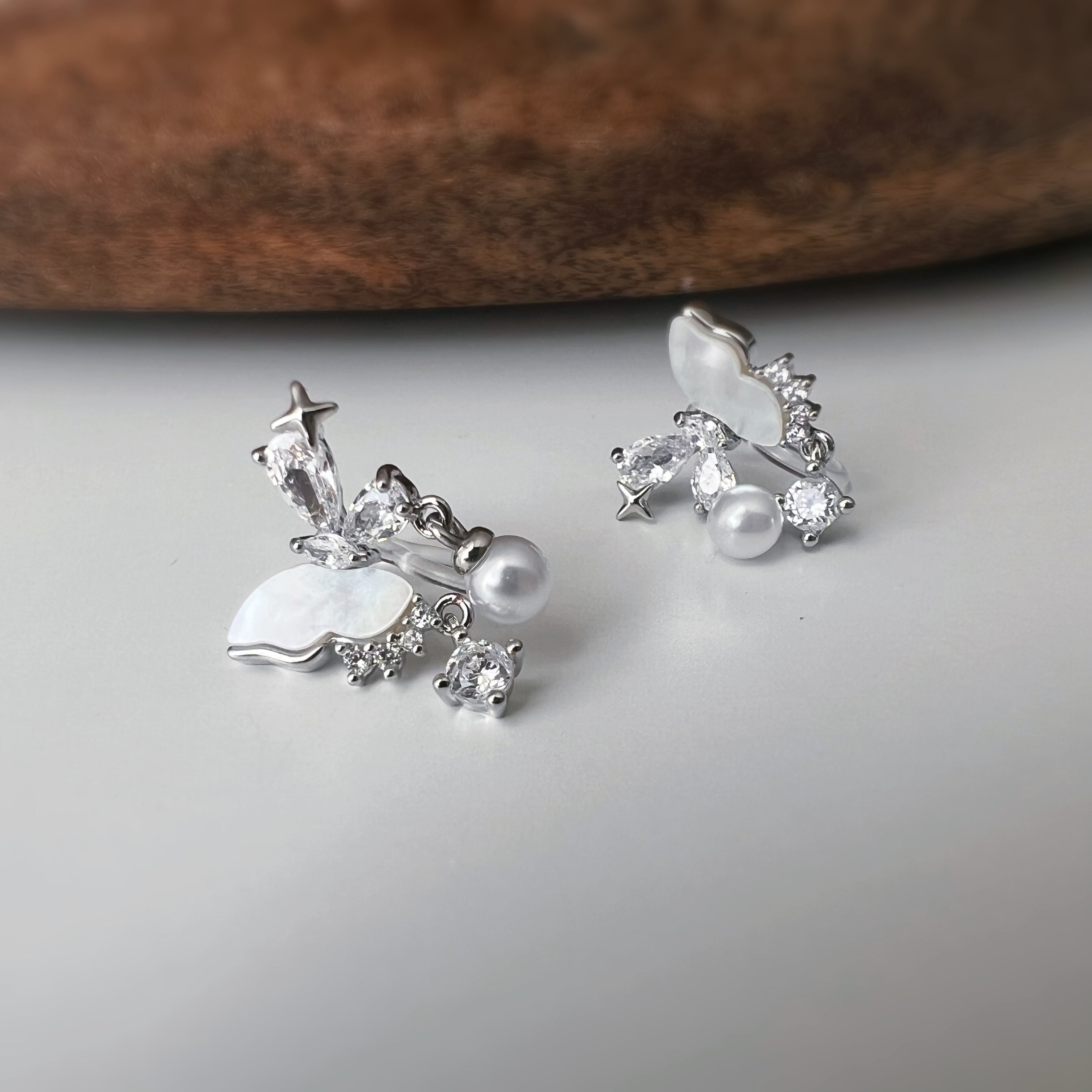 Clips d’oreilles papillon & étoiles nacrées