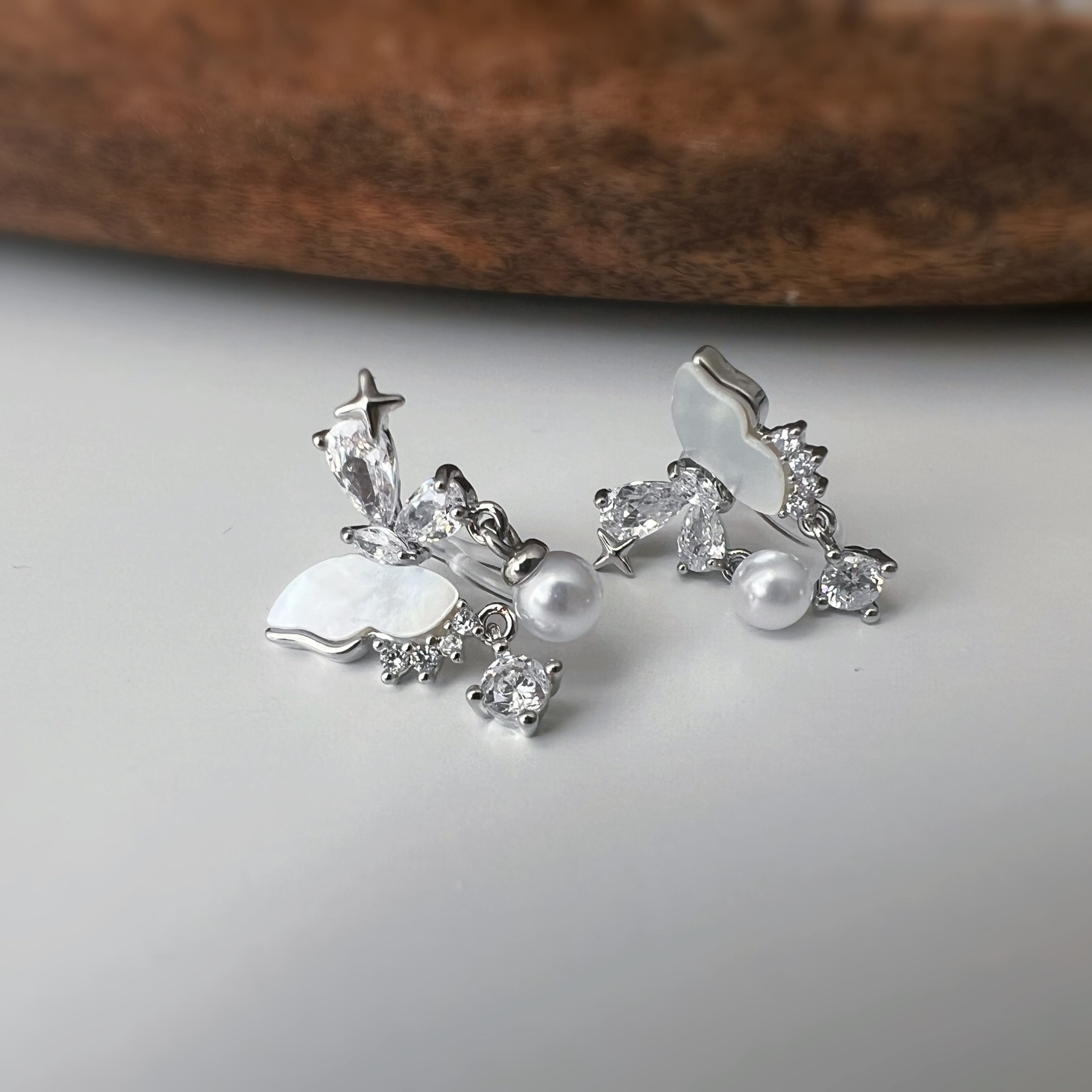 Clips d’oreilles papillon & étoiles nacrées