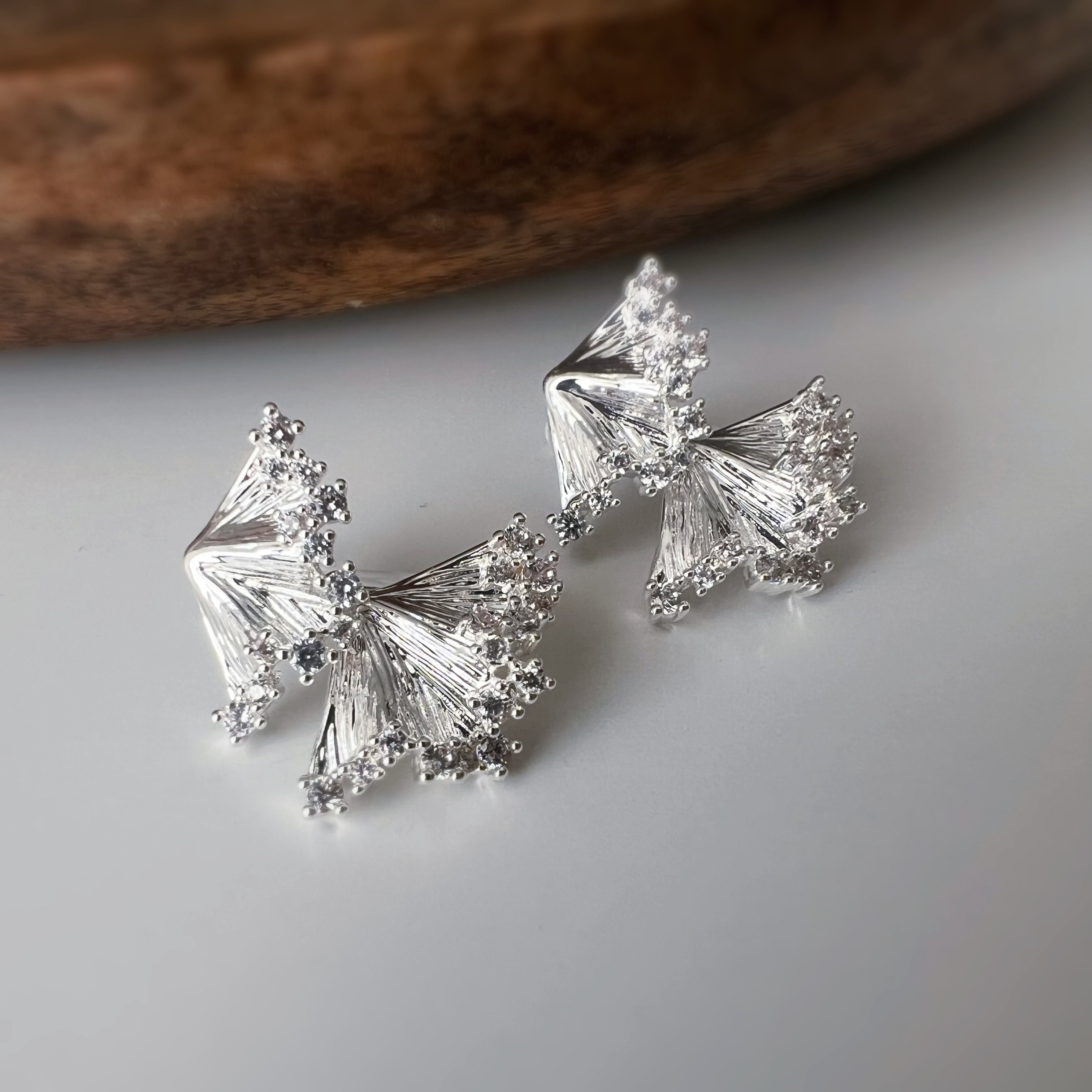 CLIPS d’oreilles nœud cristal argent