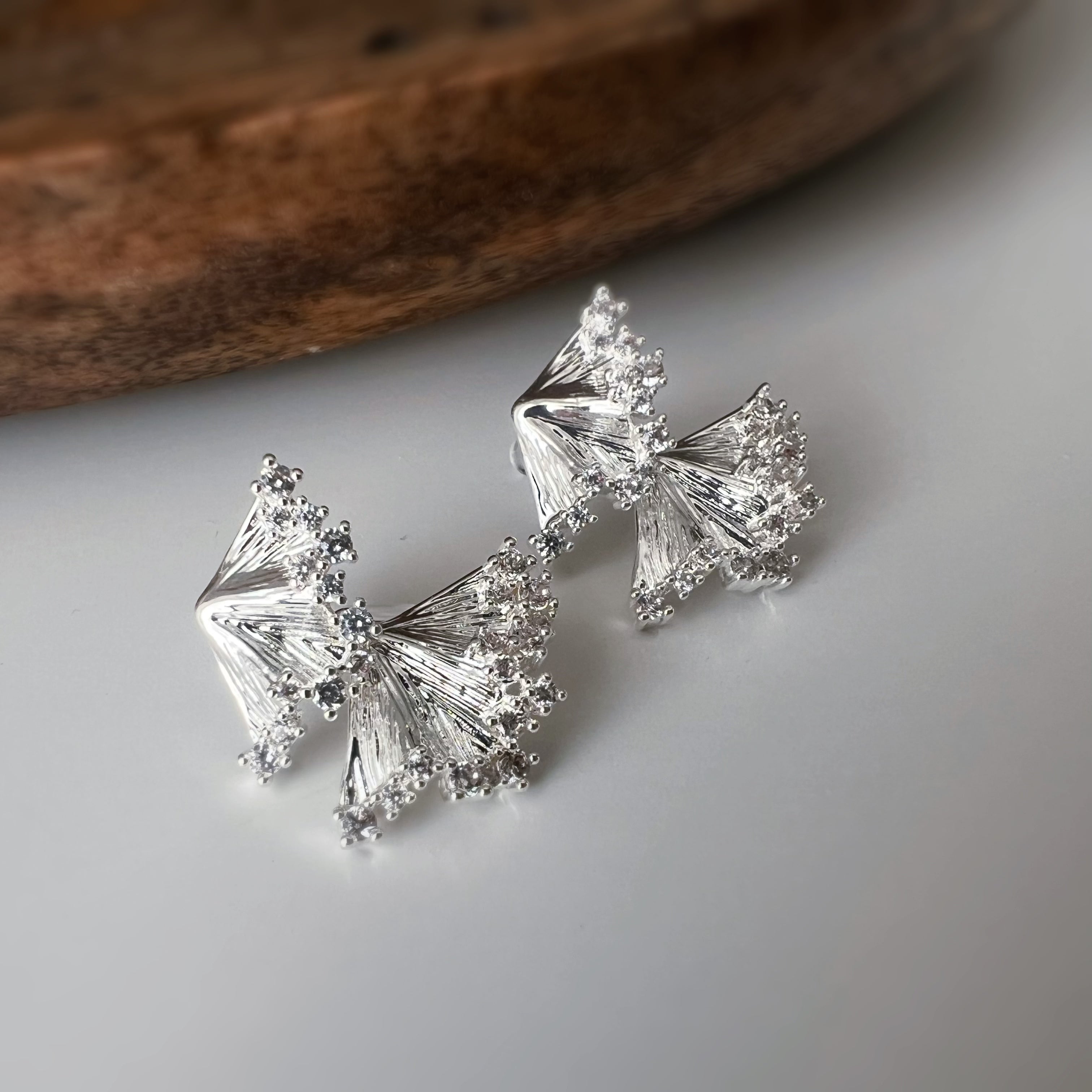 CLIPS d’oreilles nœud cristal argent