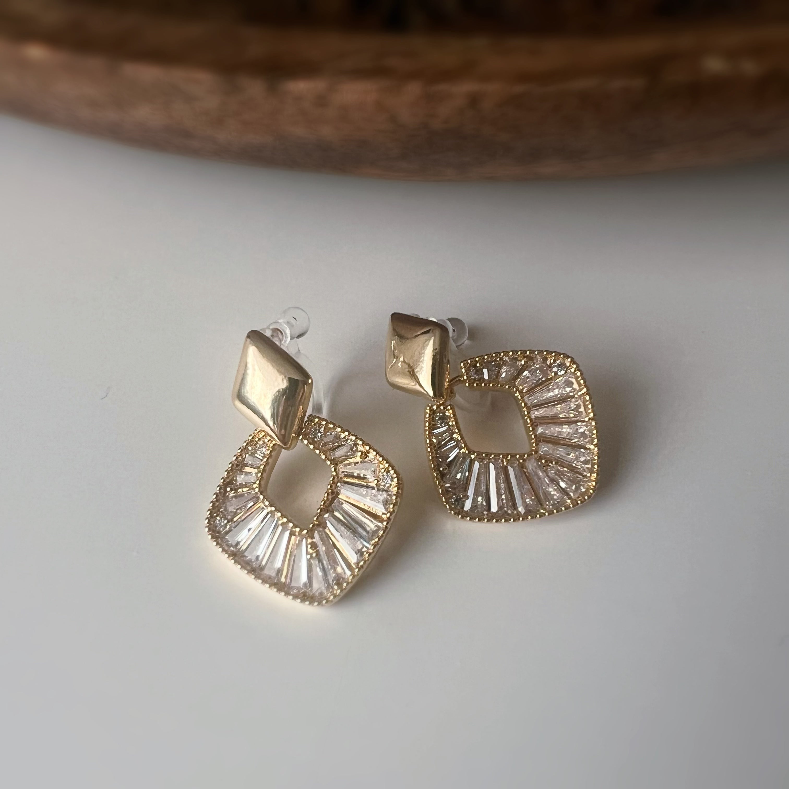 Clips d’oreilles géométriques scintillants