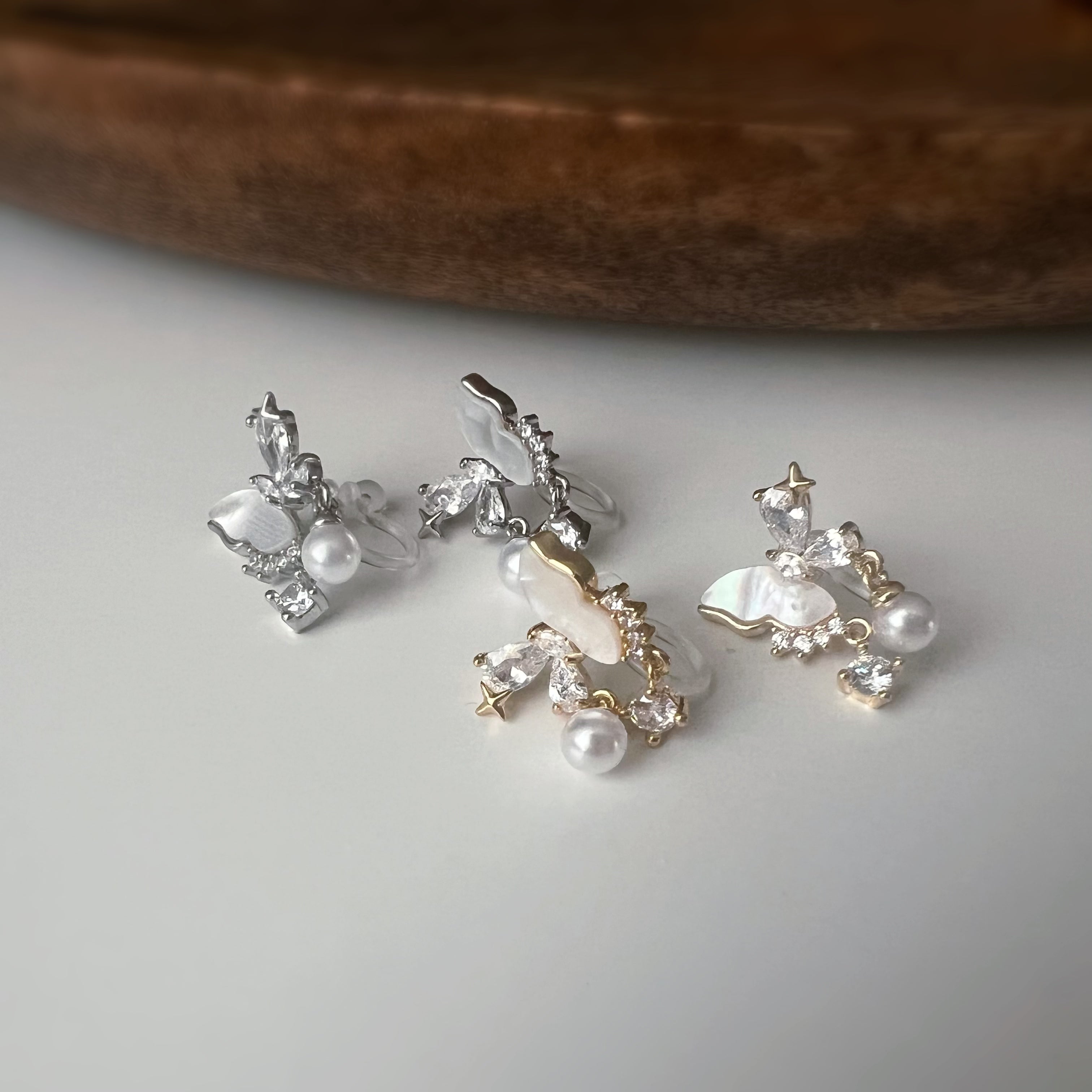 Clips d’oreilles papillon & étoiles nacrées