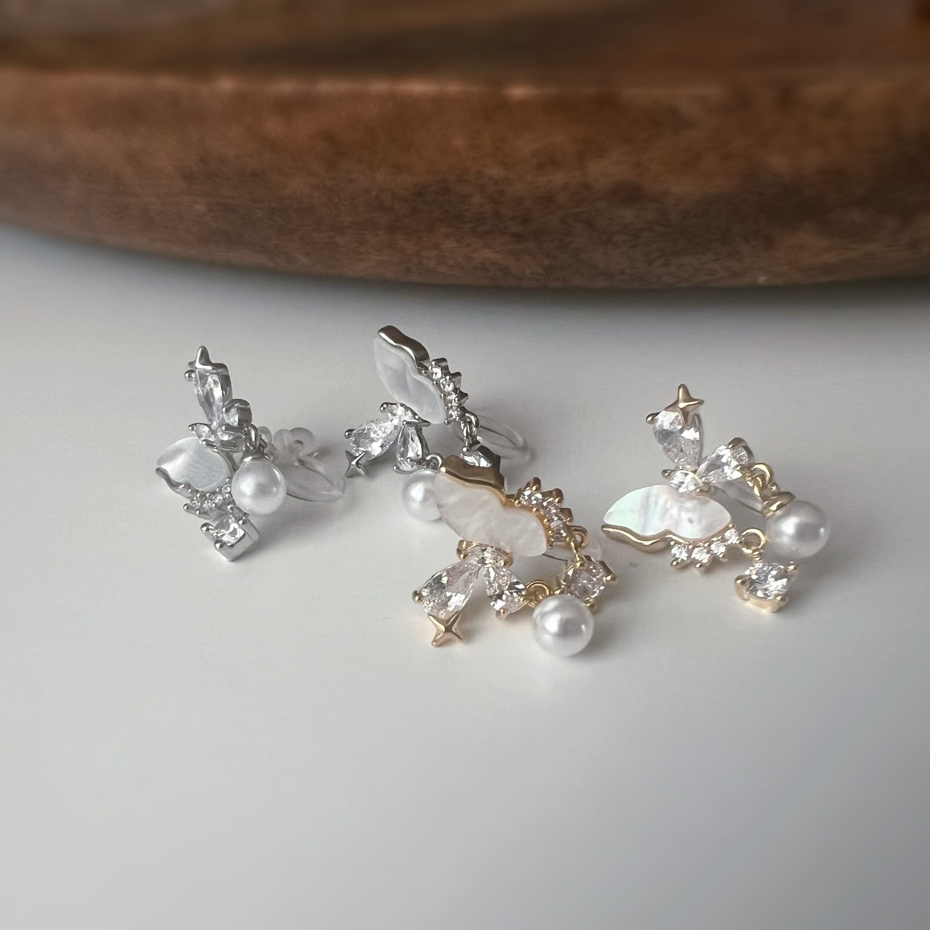 Clips d’oreilles papillon & étoiles nacrées