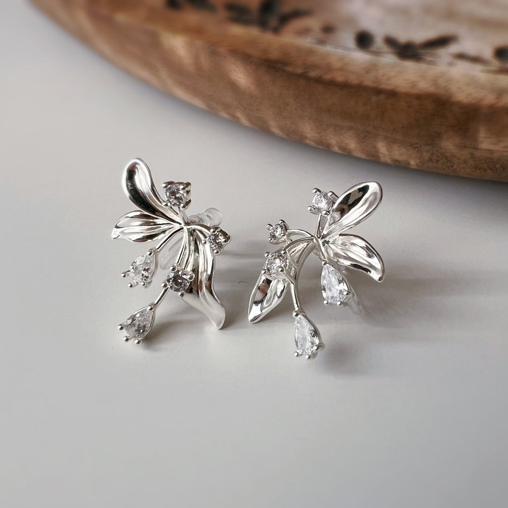 Clips d’oreilles fleur abstraite Style artistique