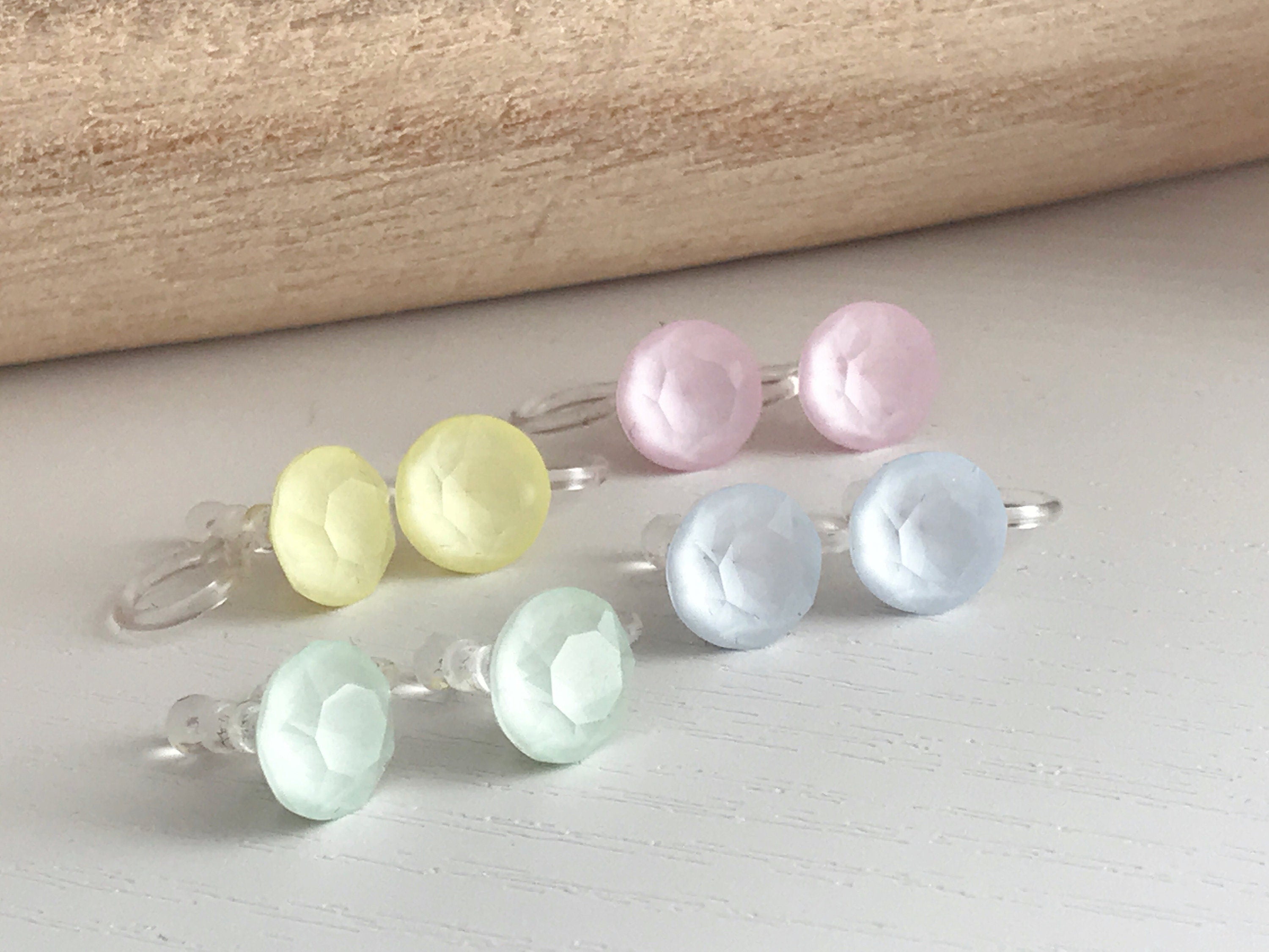 Minimalist invisible ear clips. PureCristal Crystals, Small Round Color Cream pink/ Cream green/ Cream blue/ Cream yellow. Crystal
