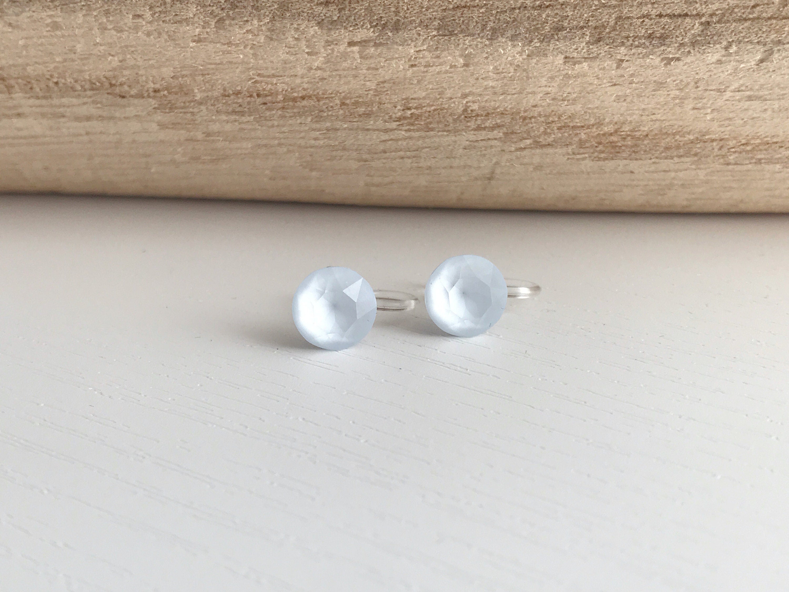 Minimalist invisible ear clips. PureCristal Crystals, Small Round Color Cream pink/ Cream green/ Cream blue/ Cream yellow. Crystal