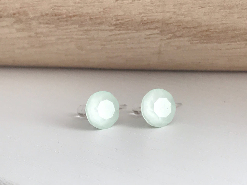 Minimalist invisible ear clips. PureCristal Crystals, Small Round Color Cream pink/ Cream green/ Cream blue/ Cream yellow. Crystal