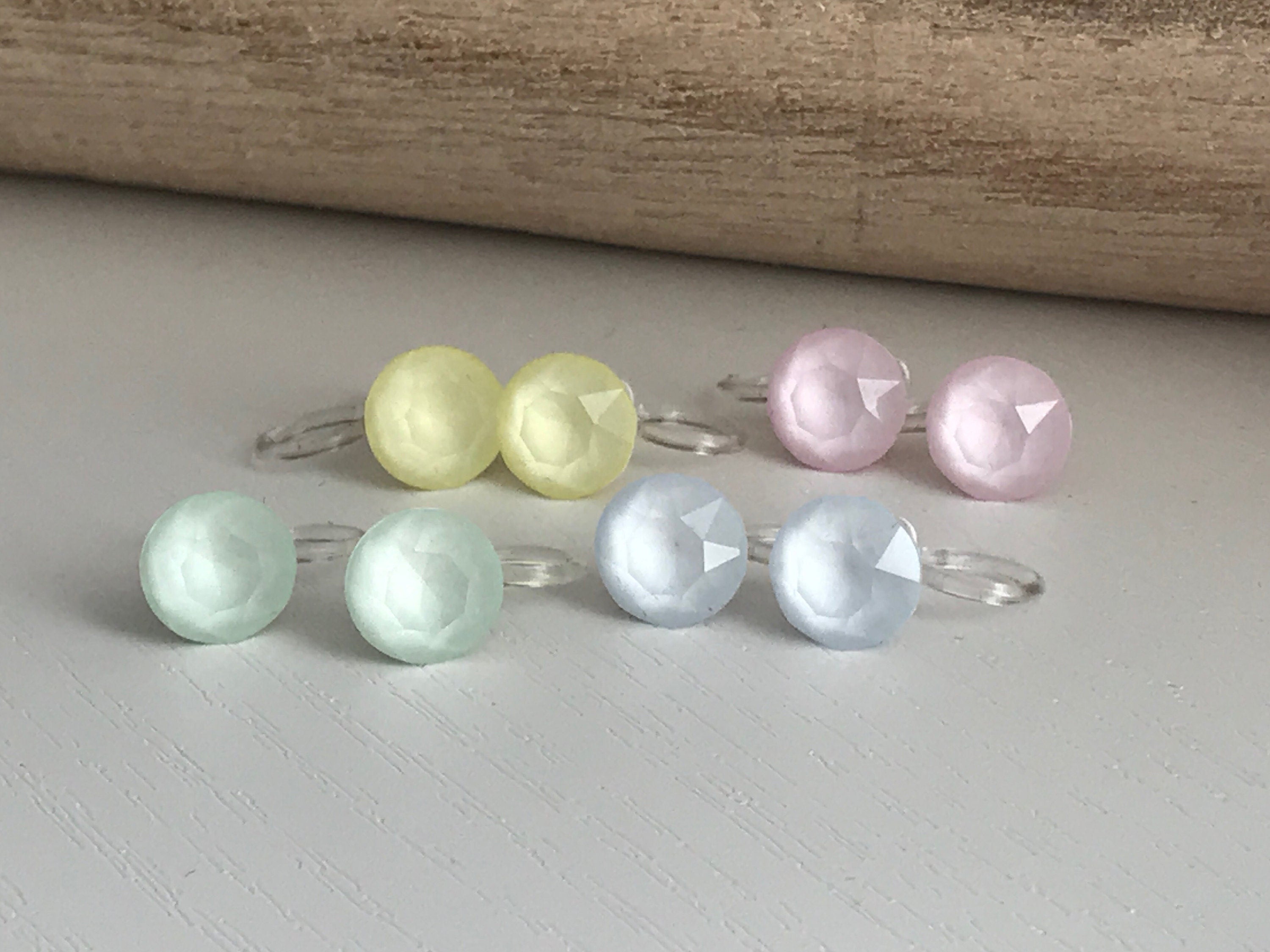 Minimalist invisible ear clips. PureCristal Crystals, Small Round Color Cream pink/ Cream green/ Cream blue/ Cream yellow. Crystal