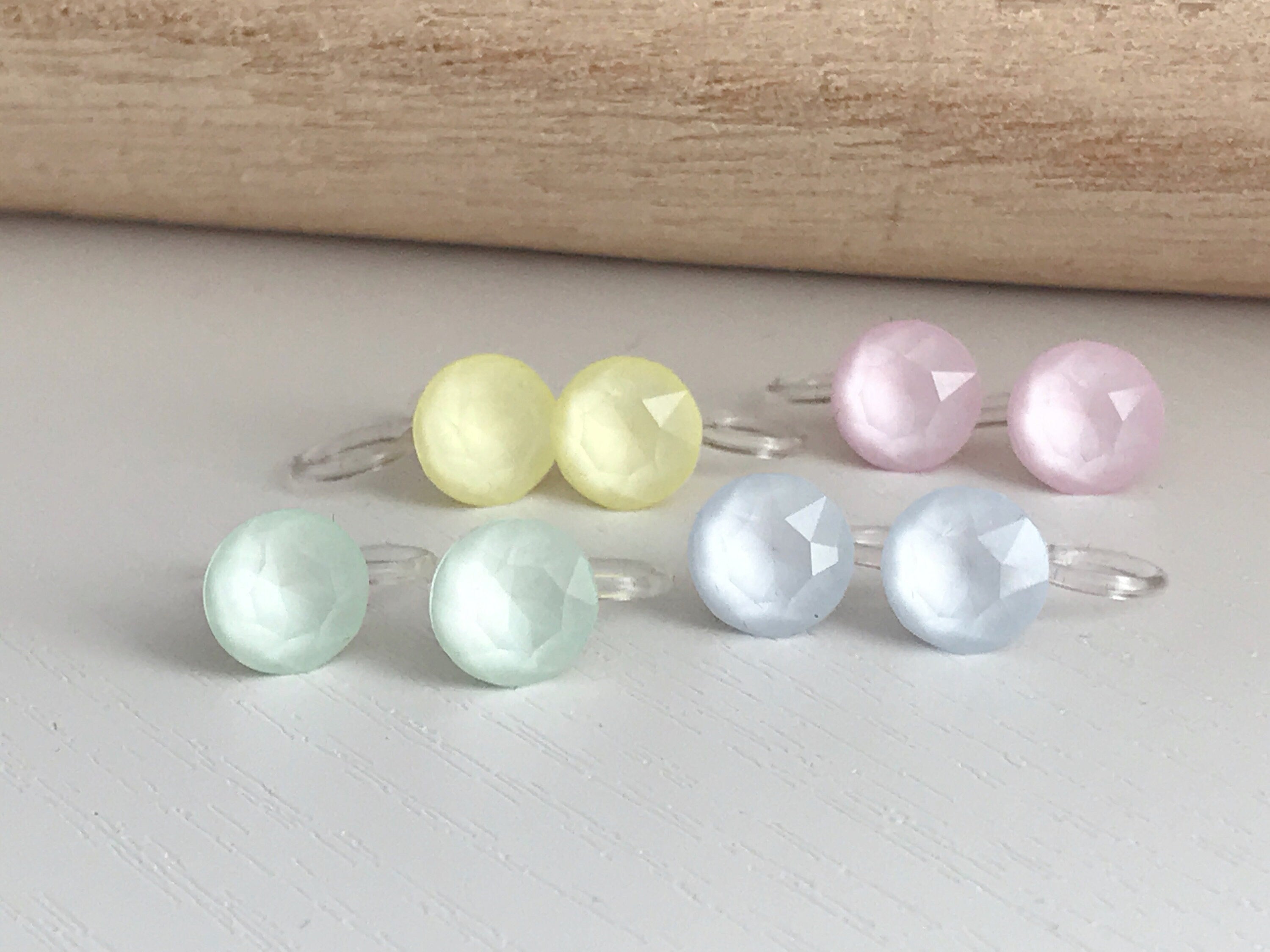 Minimalist invisible ear clips. PureCristal Crystals, Small Round Color Cream pink/ Cream green/ Cream blue/ Cream yellow. Crystal
