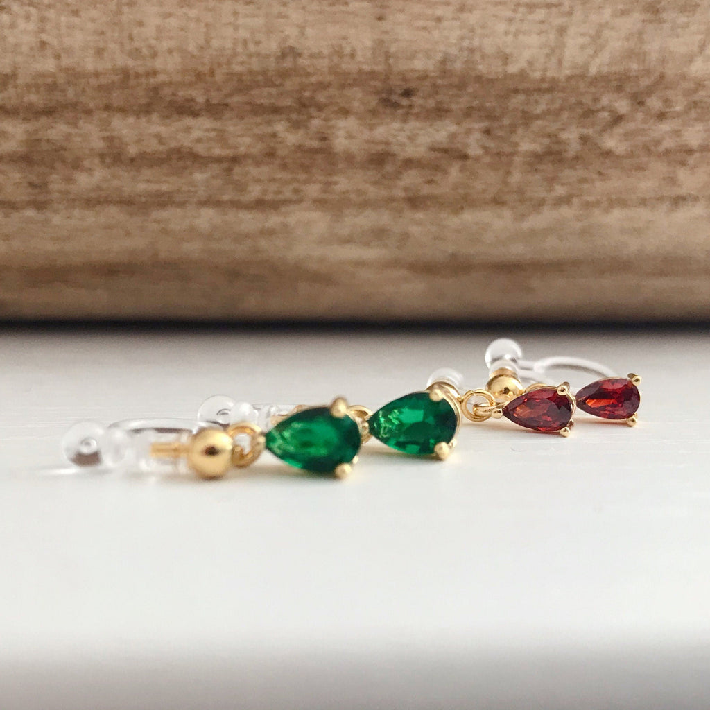 Christmas. Red or green water drop pearls. Golden invisible ear clips. Christmas gifts. Very cute Candy packaging. Ready to offer