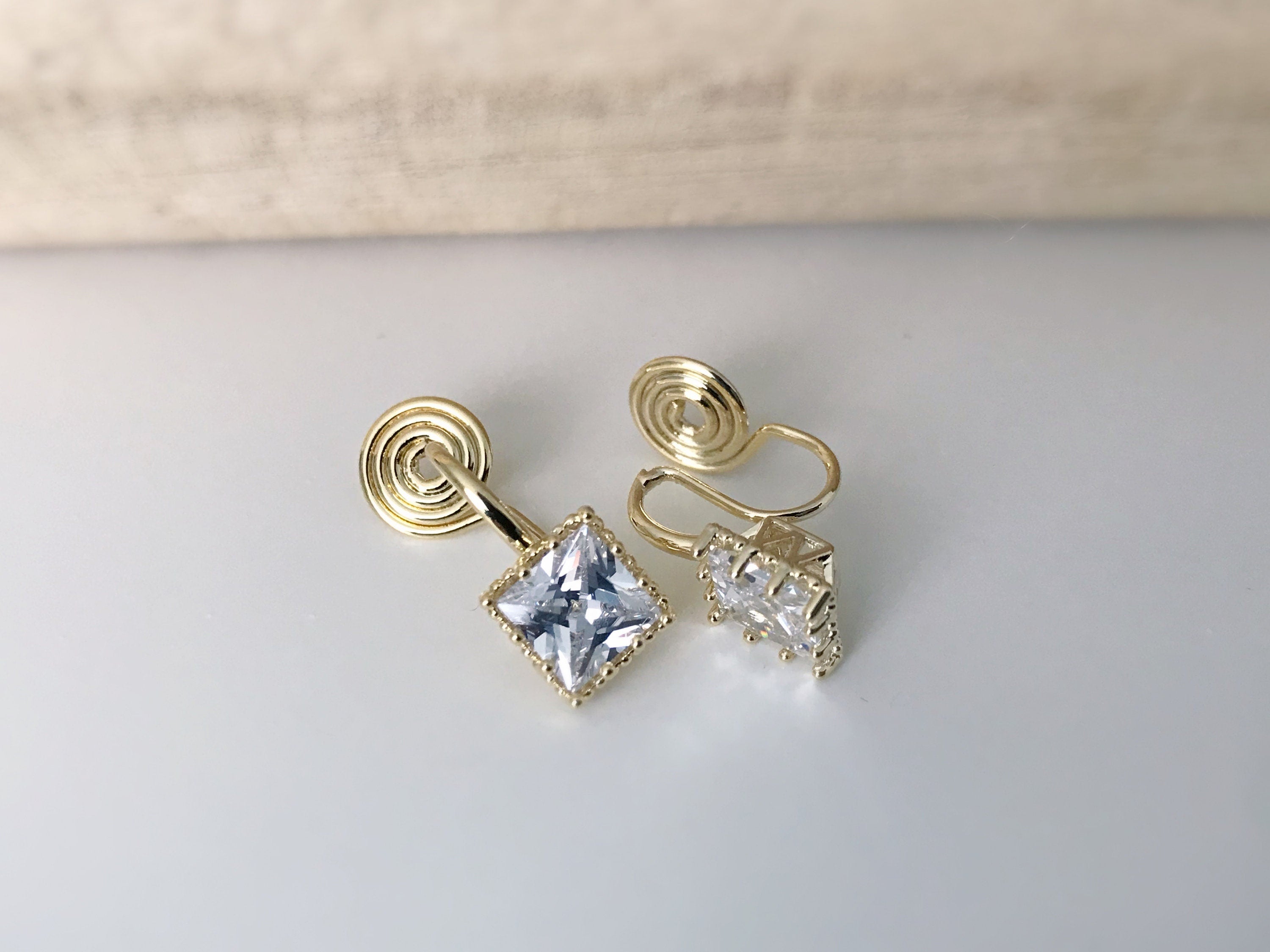 PAINLESS ! CLIPS U spiral earrings Small square Zircon stone Gold color. Comfortable delicate ear clips Ready to offer