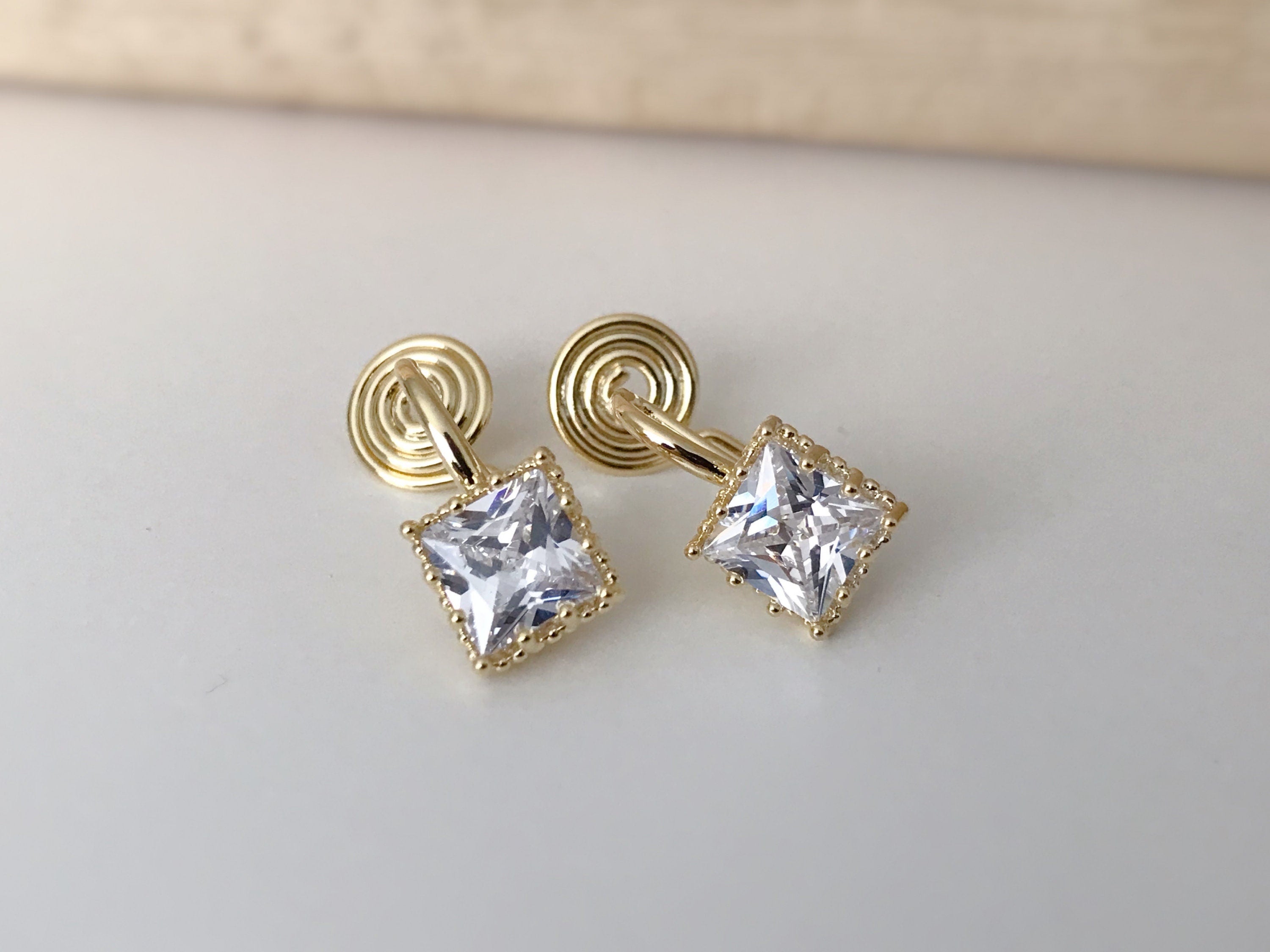 PAINLESS ! CLIPS U spiral earrings Small square Zircon stone Gold color. Comfortable delicate ear clips Ready to offer