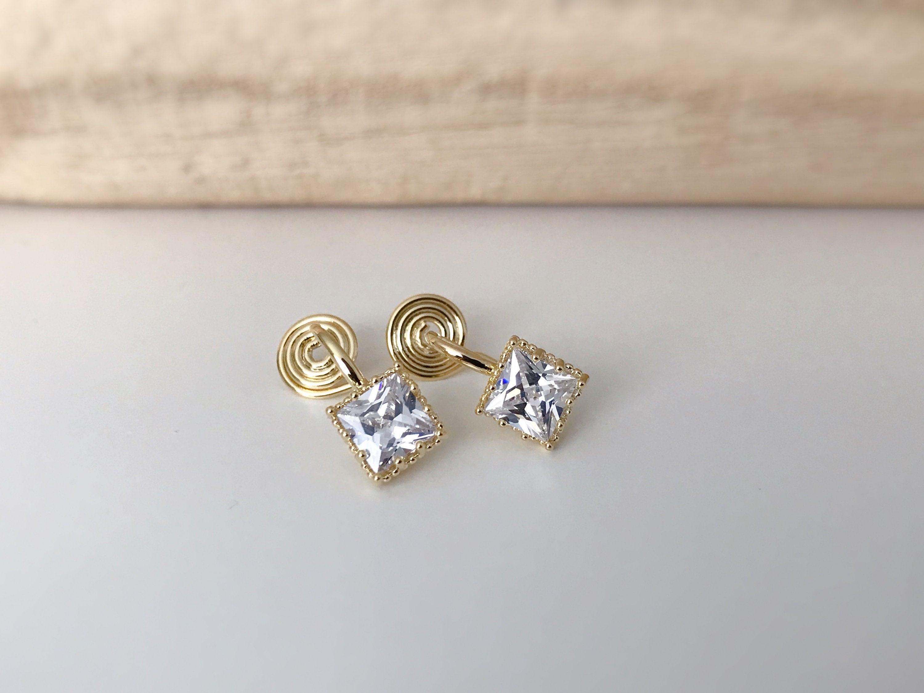 PAINLESS ! CLIPS U spiral earrings Small square Zircon stone Gold color. Comfortable delicate ear clips Ready to offer