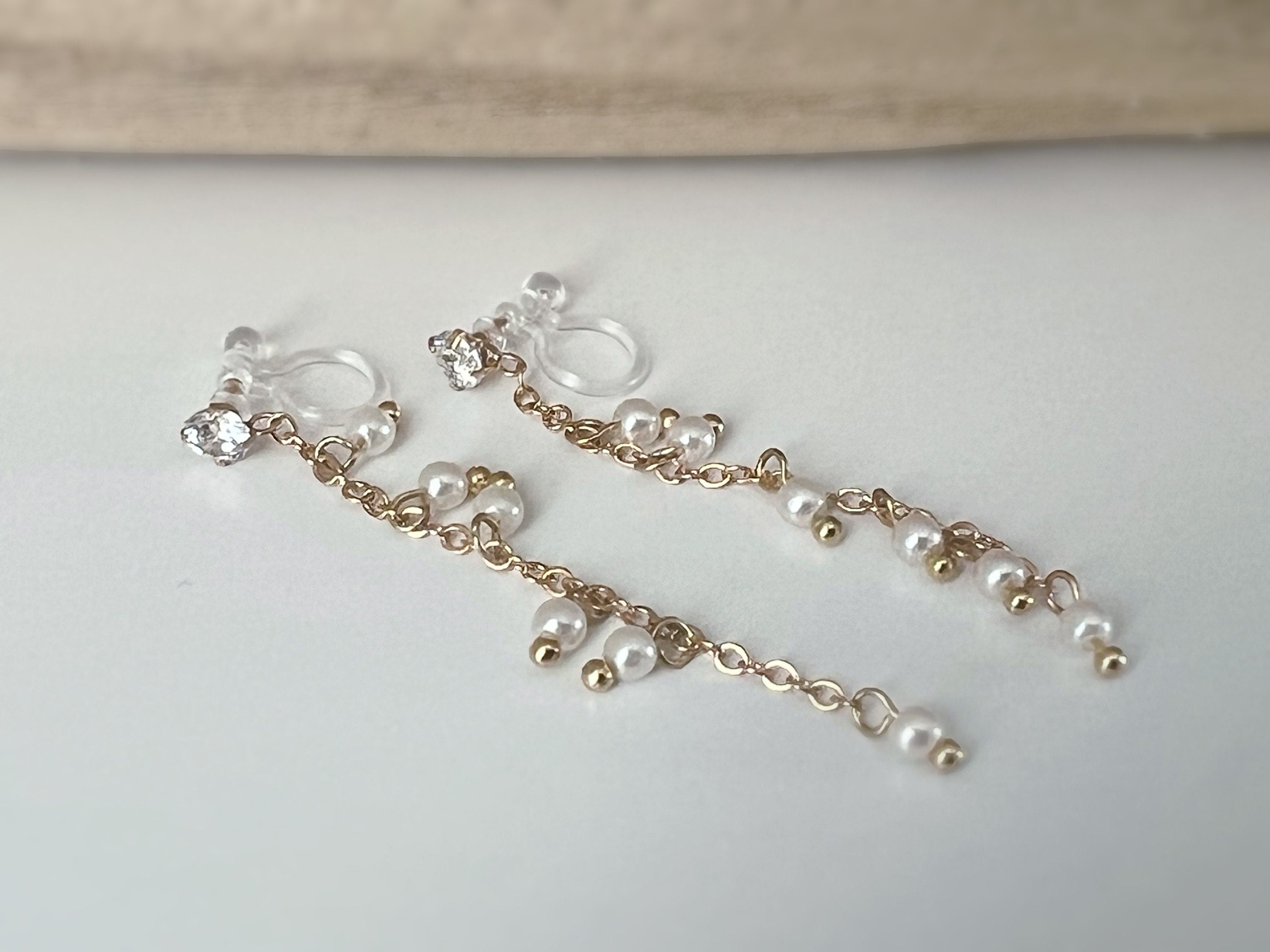 INVISIBLE clip earrings, mini zircon dangling ear clips, white pearls, gold chain. Daily jewelry for non-pierced ears