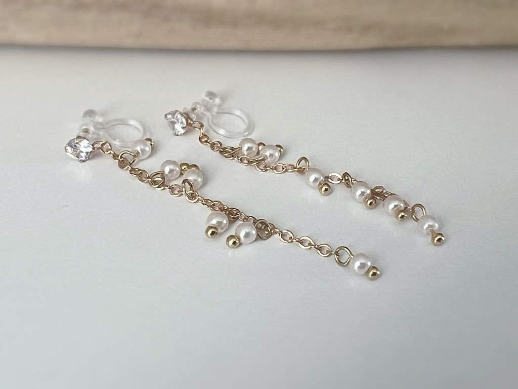 INVISIBLE clip earrings, mini zircon dangling ear clips, white pearls, gold chain. Daily jewelry for non-pierced ears