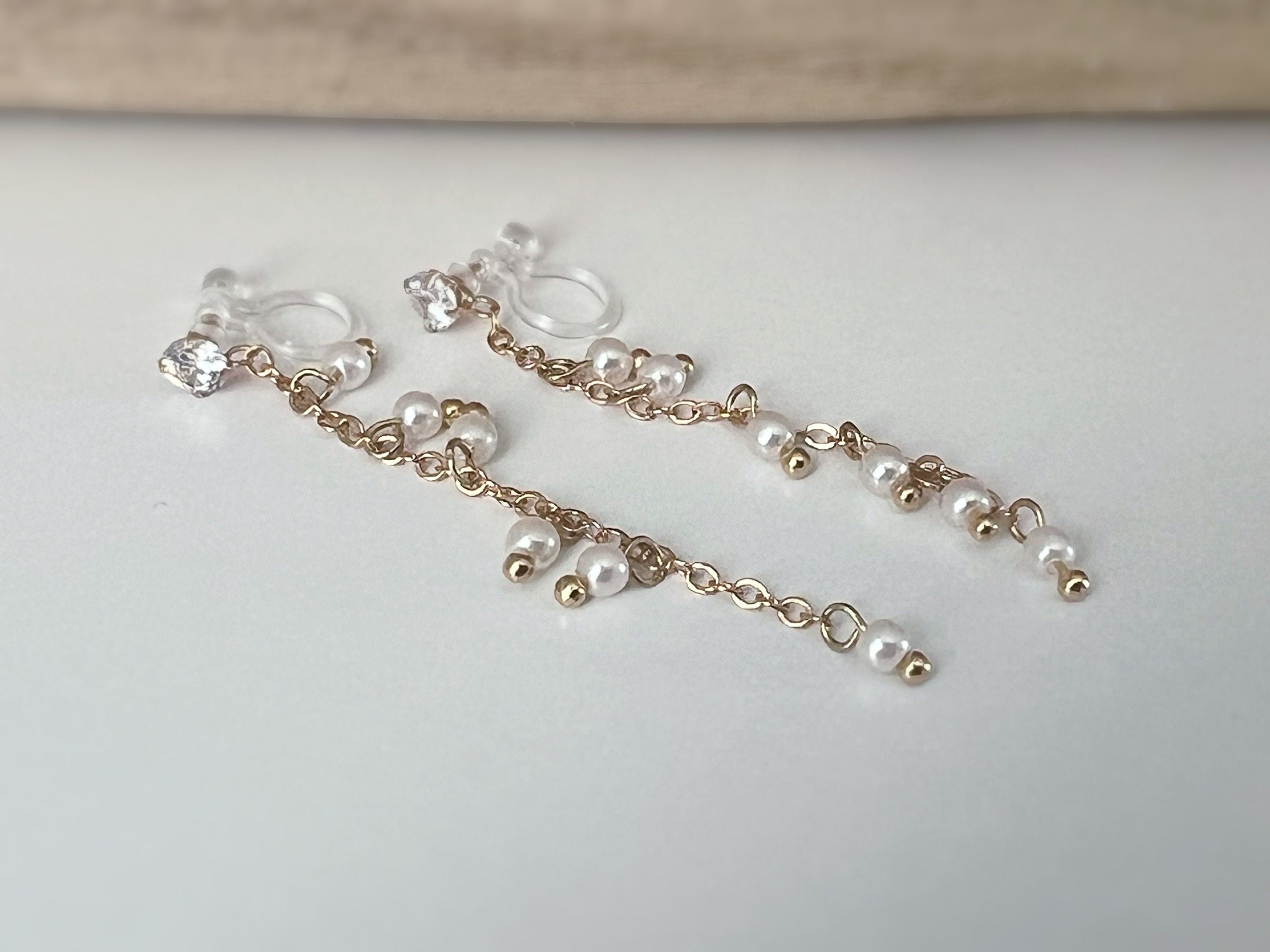 INVISIBLE clip earrings, mini zircon dangling ear clips, white pearls, gold chain. Daily jewelry for non-pierced ears