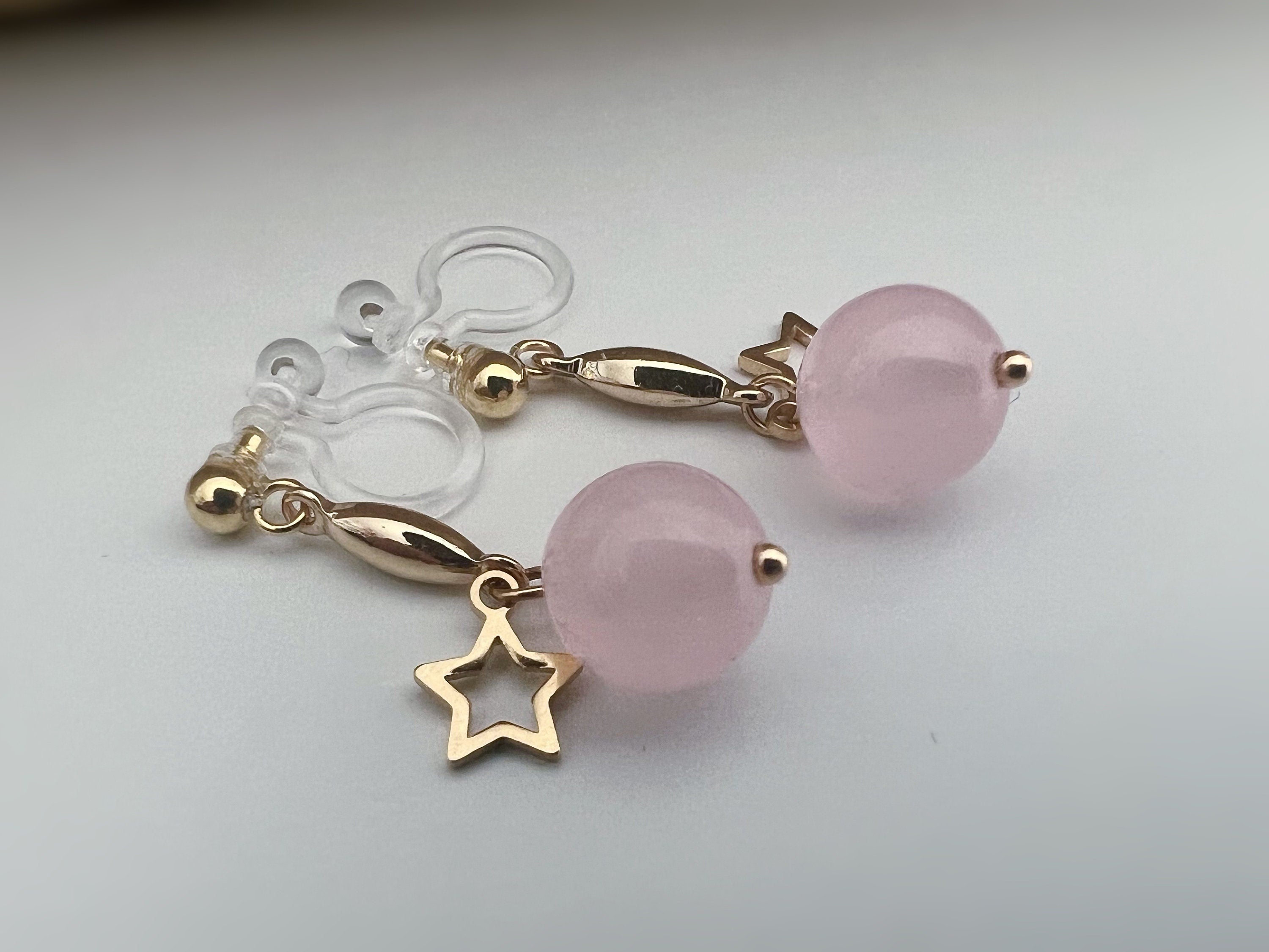 INVISIBLE CLIPS dangling earrings Gold, Pastel colored pearl macaroons Blue Pink Green Purple, Small hollow star.
