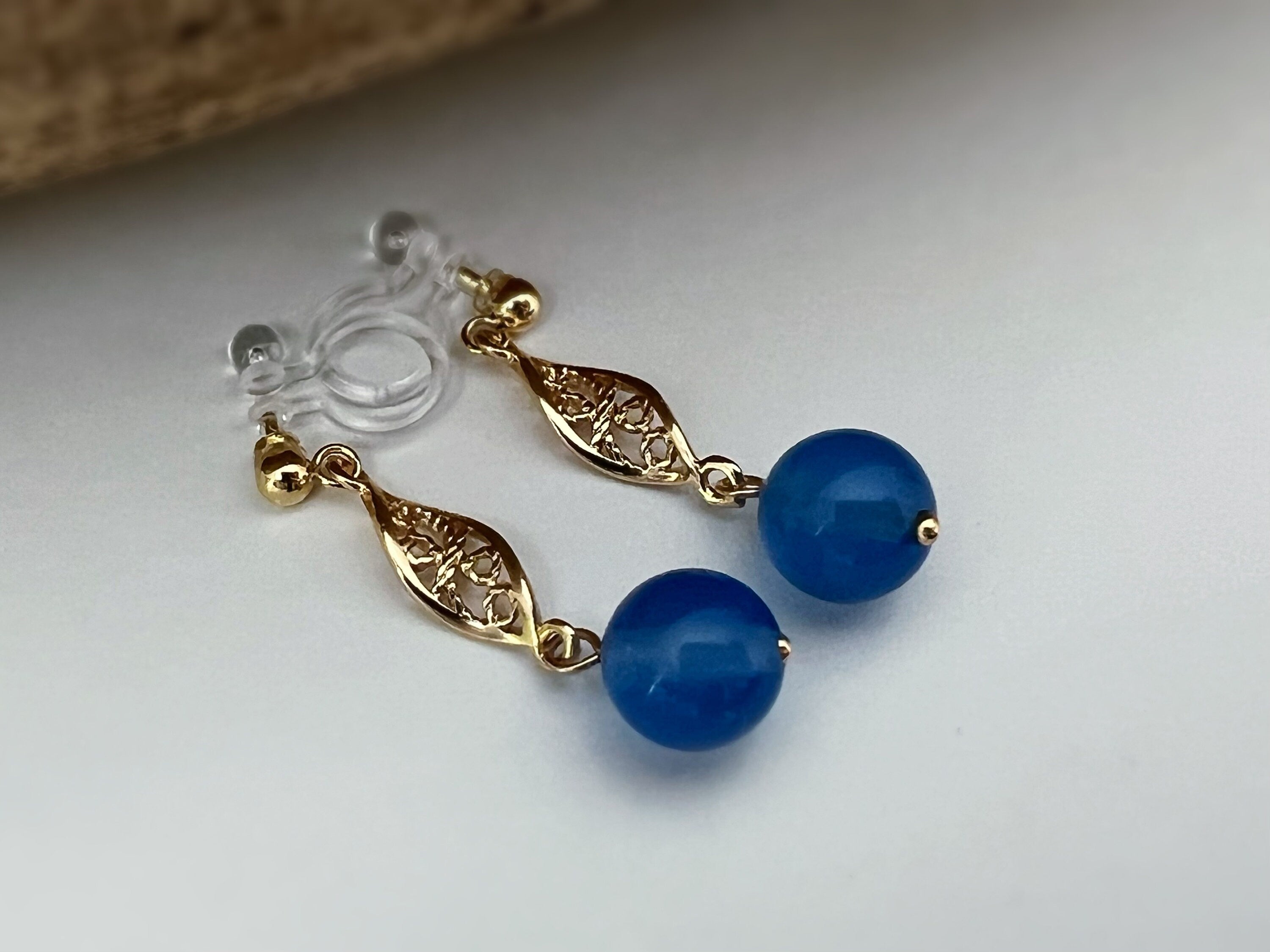 INVISIBLE Clip Earrings, Gold Ear Clips Hollow almond-shaped sculpture with blue pearl Daily jewelry. Ready to gift.
