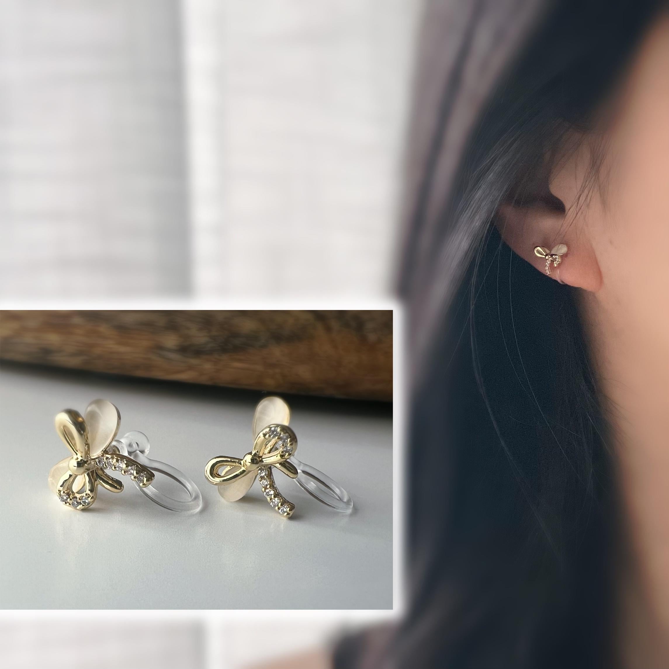 Boucles d'oreilles clip en forme de nœud doré ornées strass scintillants Délicates elles ajoutent une touche de charme raffiné à votre style