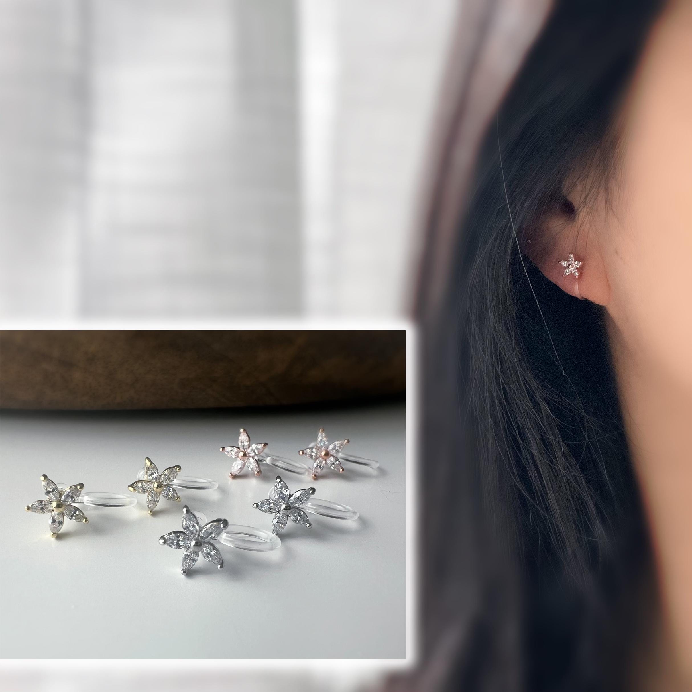 Mini Boucles d'oreilles clip fleur scintillante or/ argent/ or rose. Élégantes, elles ajoutent une touche raffinée à votre look.