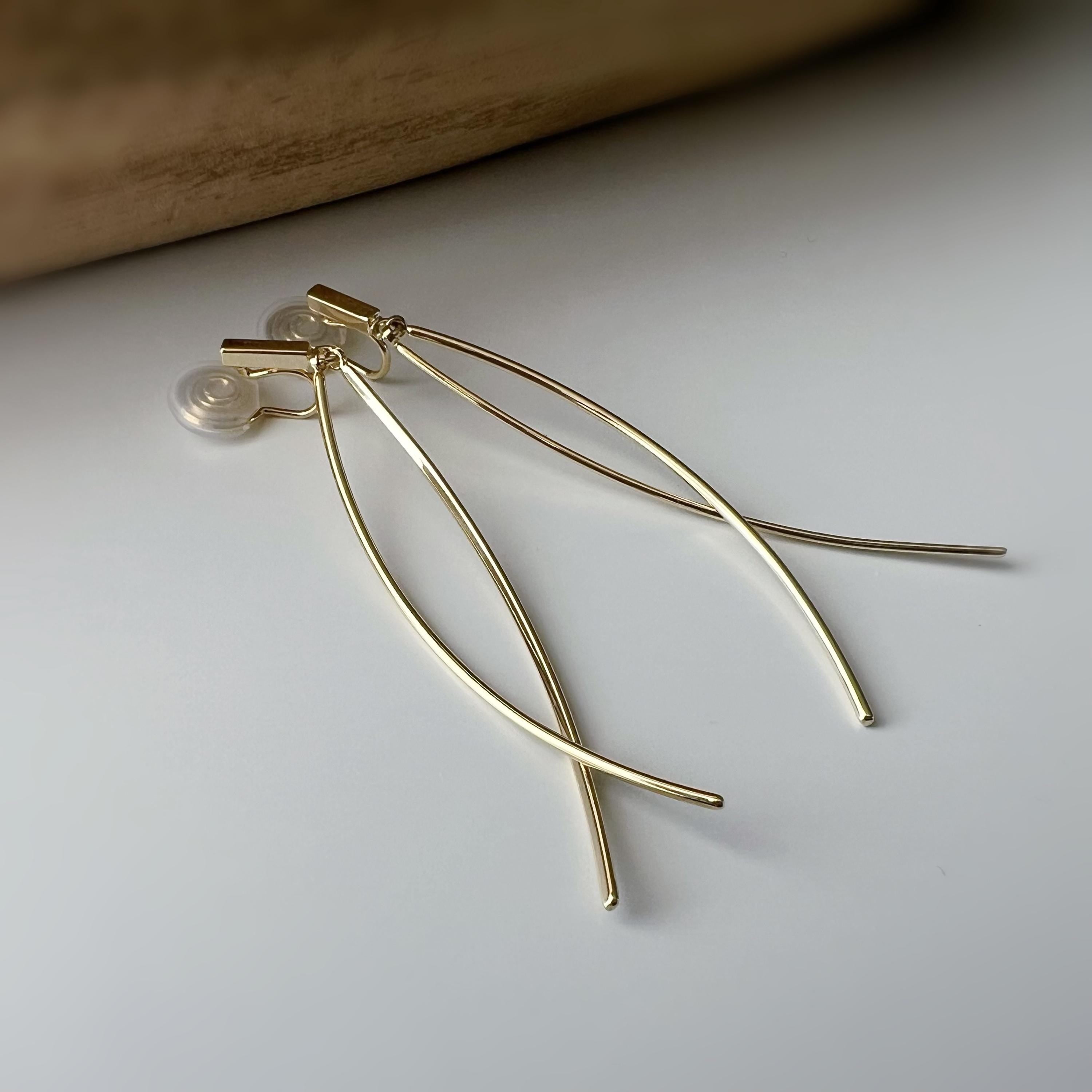 Boucles d'oreilles clips minimalistes longue barre courbée Or/ Argent design épuré et élégant. Parfaites pour un look moderne et sophistiqué