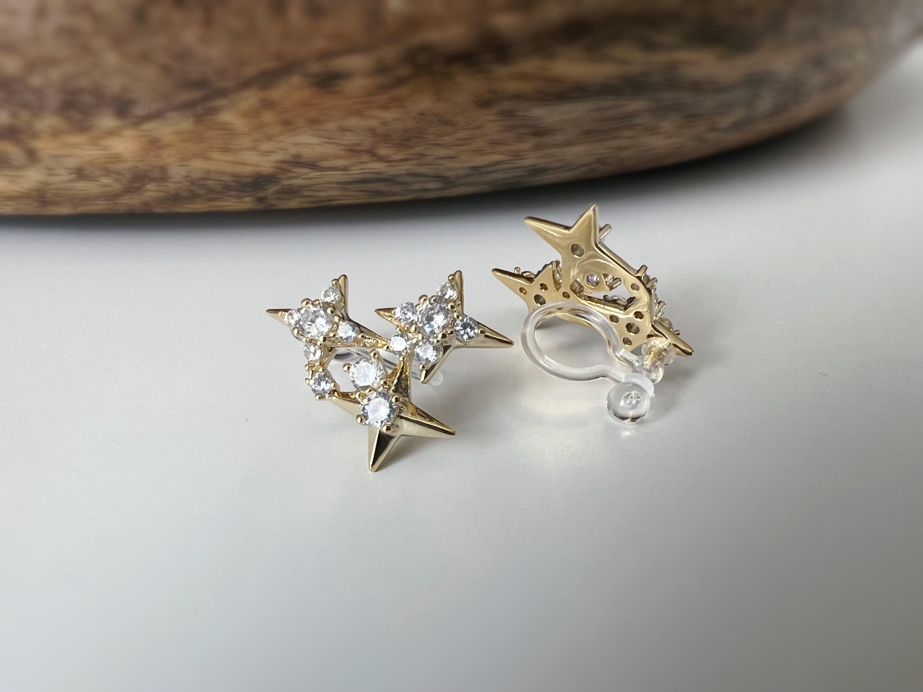 Clips d’oreilles en forme d’étoiles scintillantes zircon couleur argent/ or parfait pour illuminer vos looks sans avoir les oreilles percées