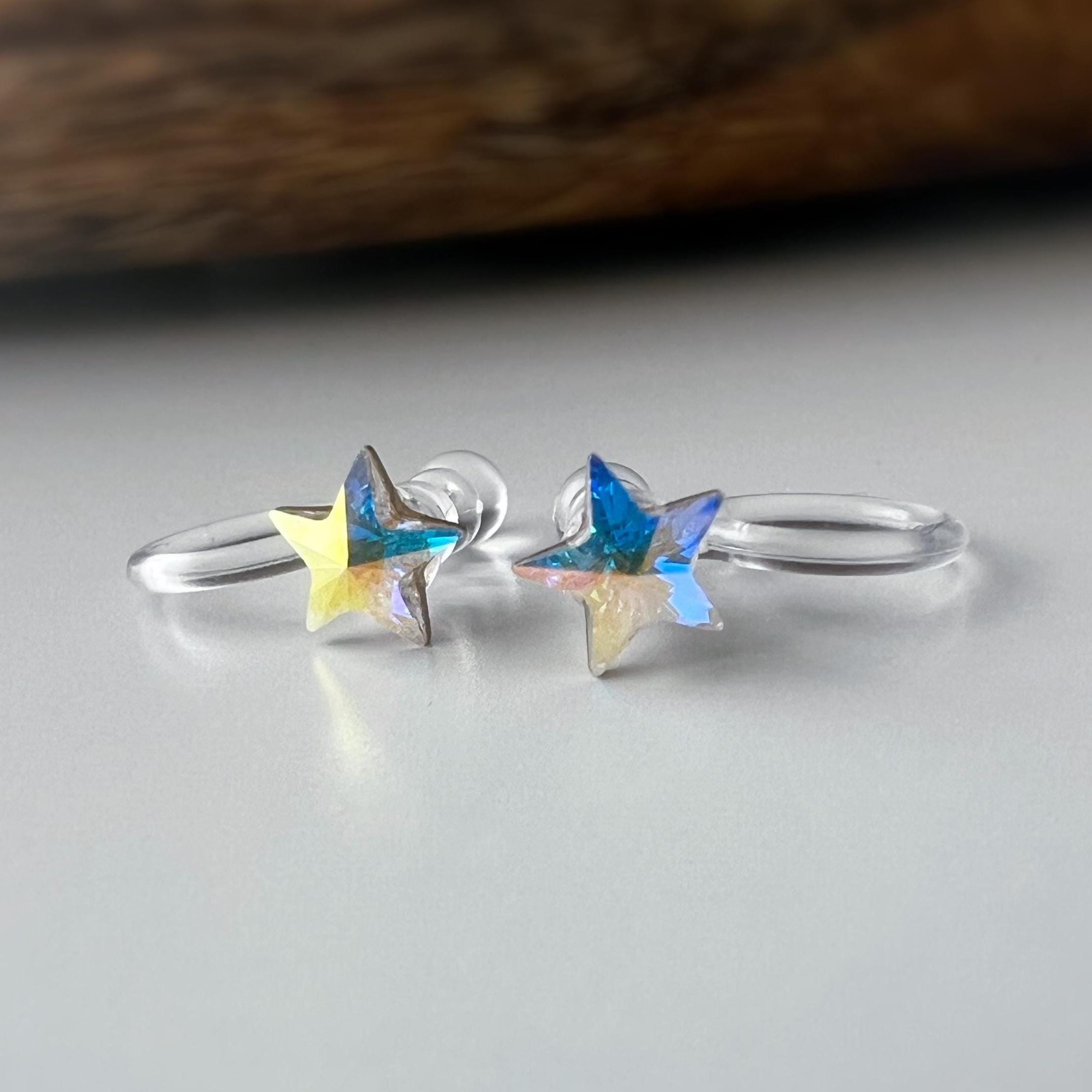 Mini étoile Cristaux PureCrystal Boucles d’oreilles clip légères et confortables, idéales pour illuminer vos tenues sans perçage.